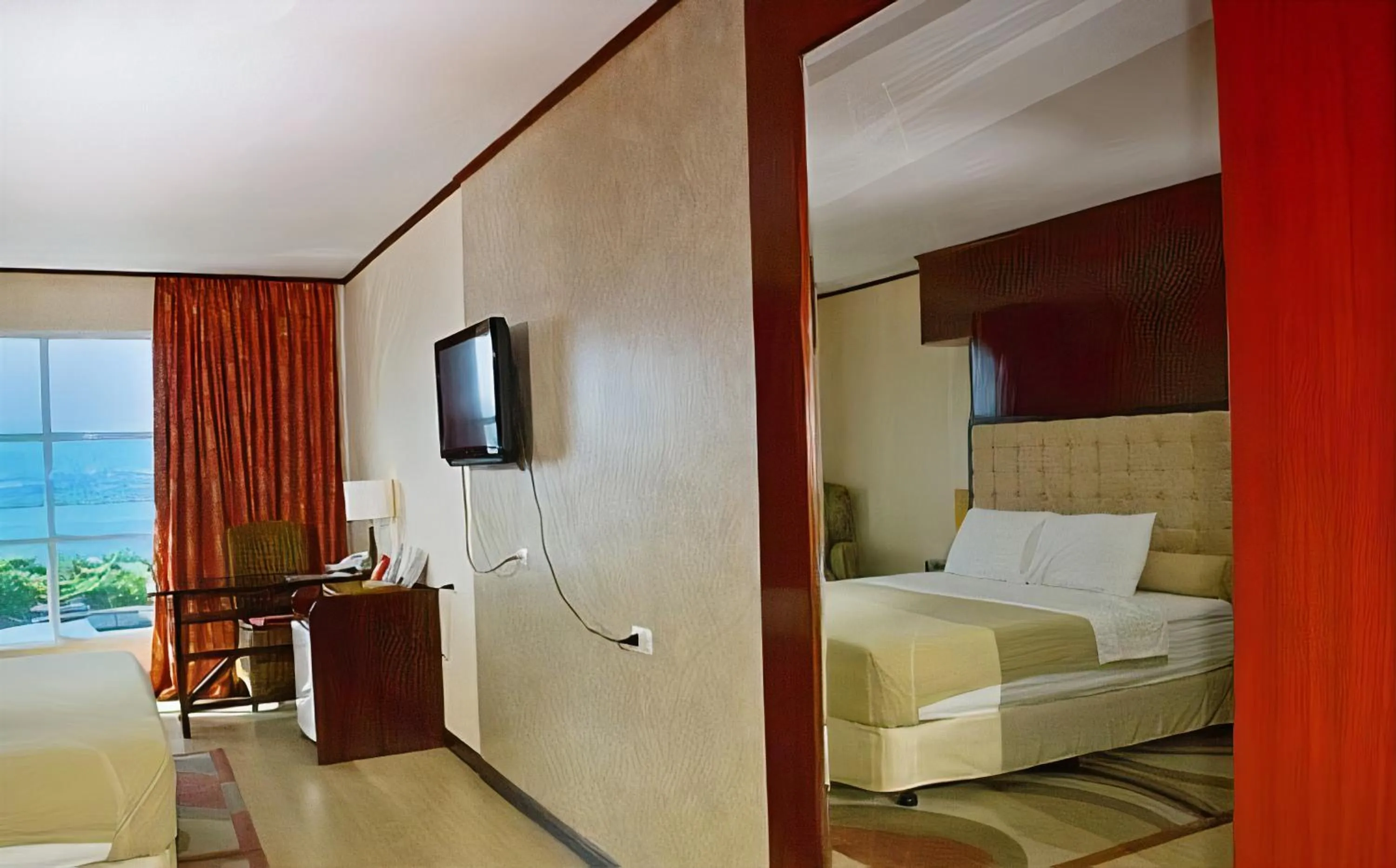 TV and multimedia, Bed in Cebu Dulcinea Hotel and Suites-MACTAN AIRPORT HOTEL
