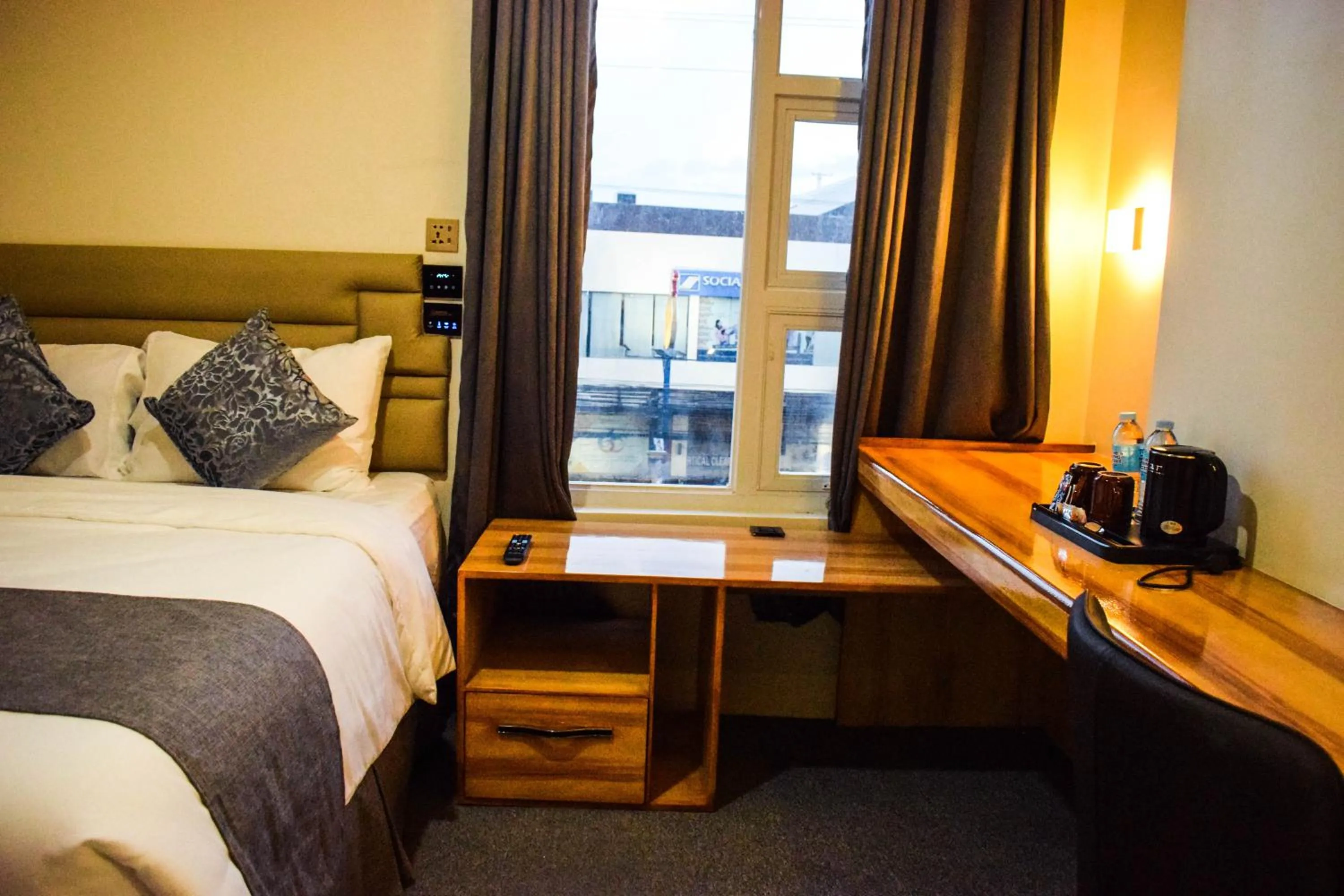 Bed in Cebu Dulcinea Hotel and Suites-MACTAN AIRPORT HOTEL