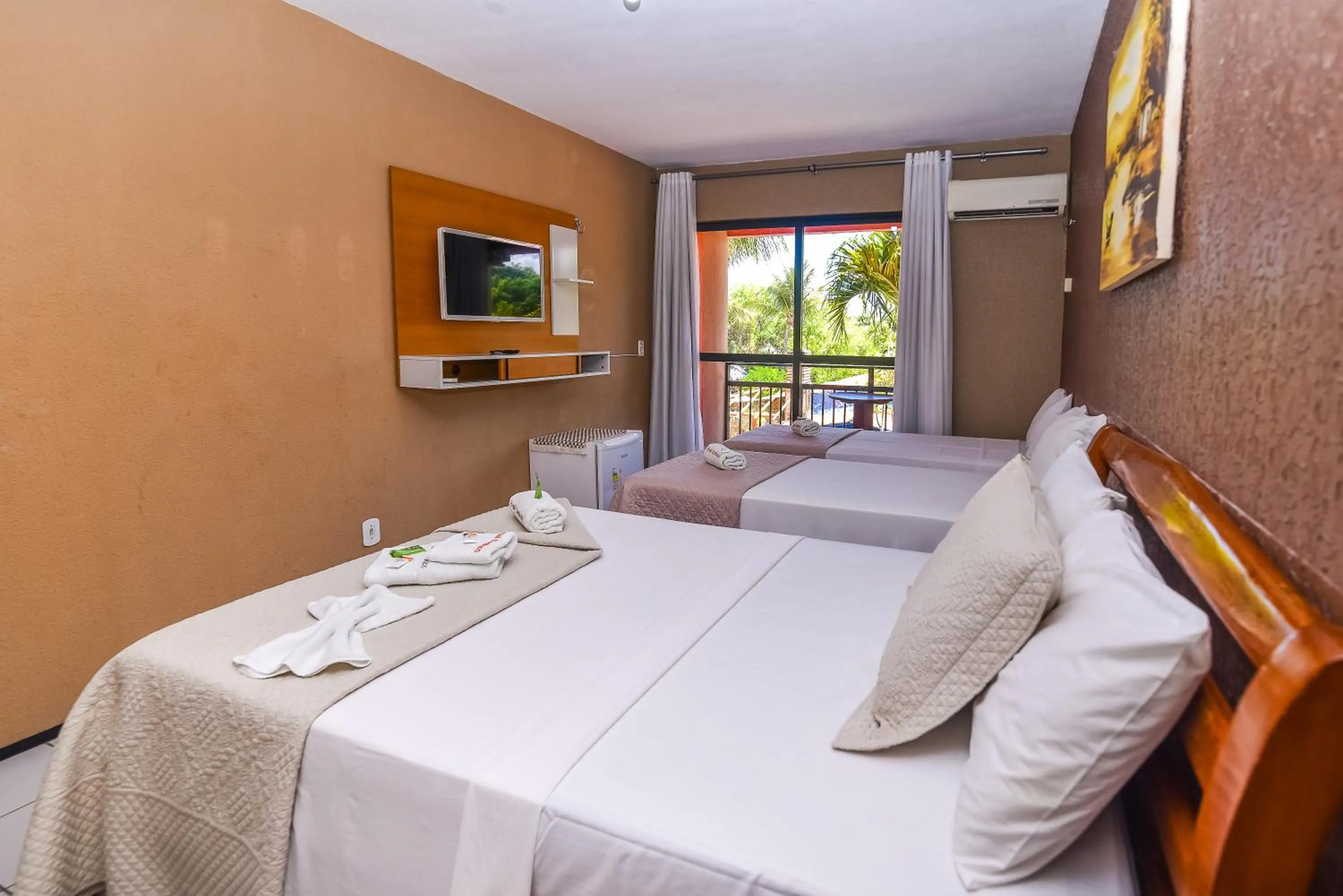 Bed in Pousada Brasil Cumbuco