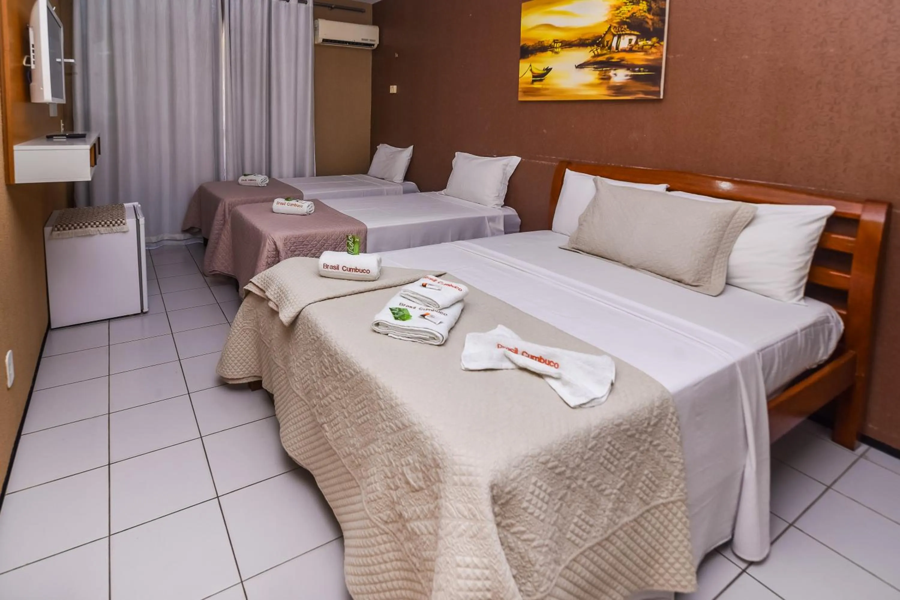 Bed in Pousada Brasil Cumbuco