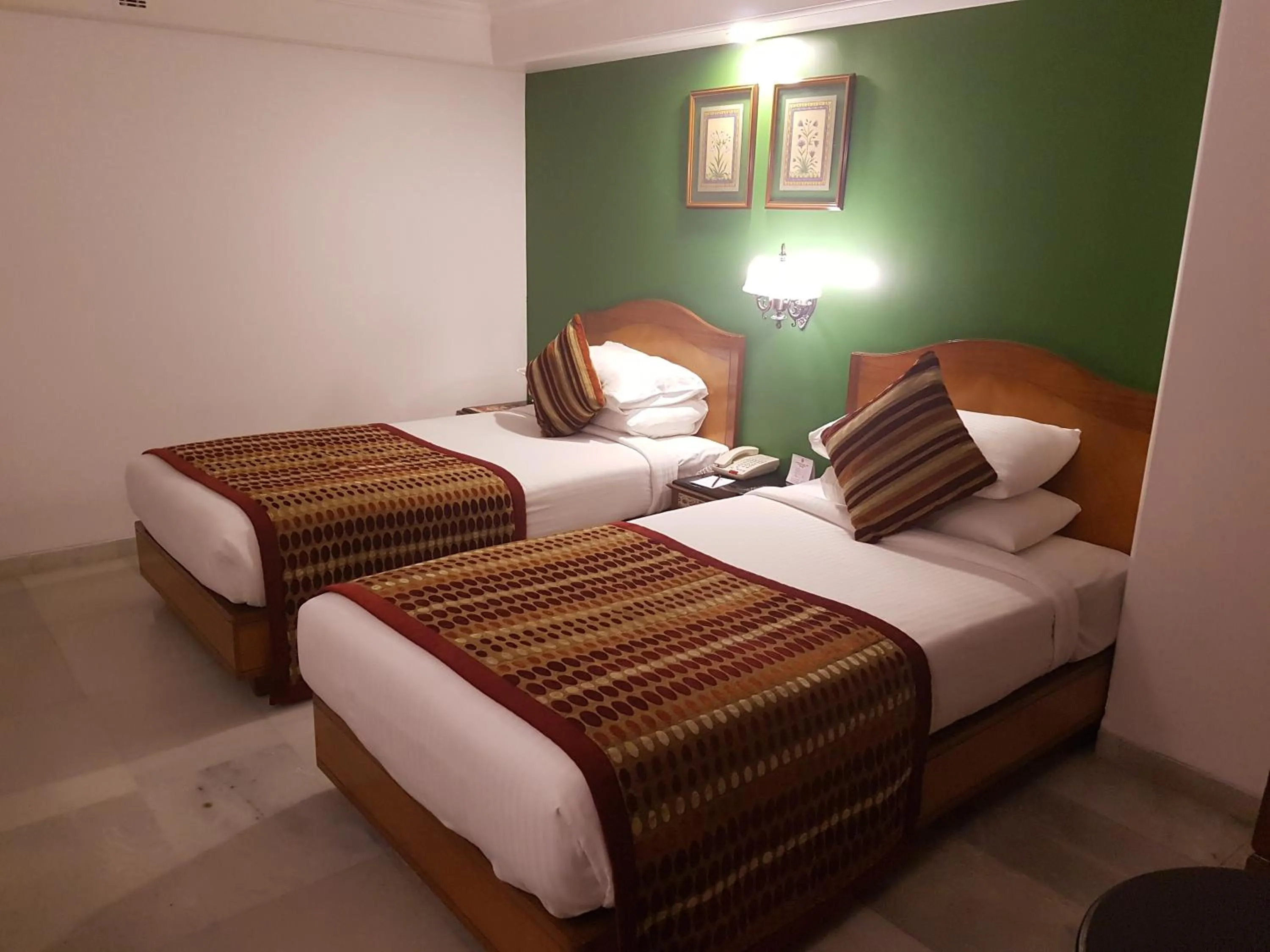 Bed in Ramee Guestline Hotel Dadar