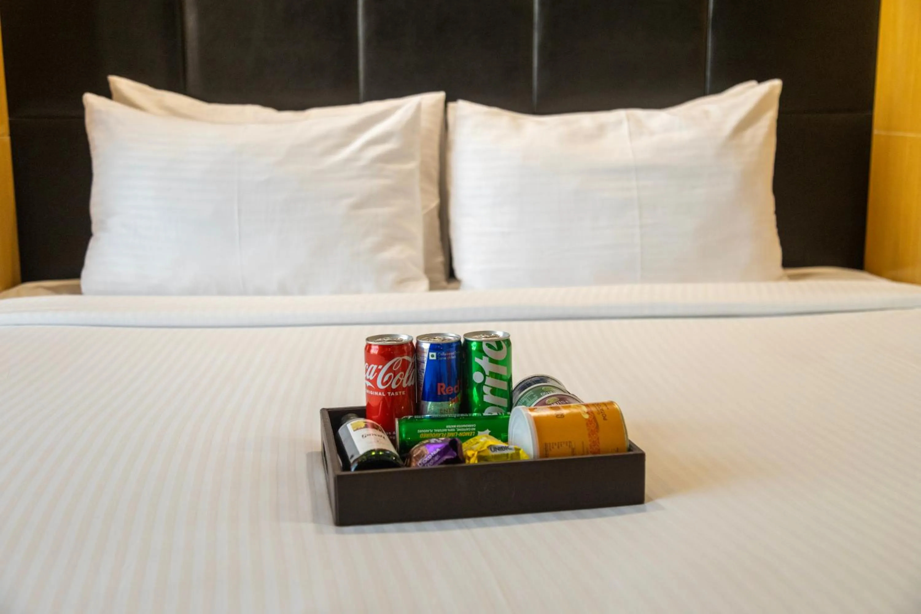 Bed in Ramee Guestline Hotel Dadar