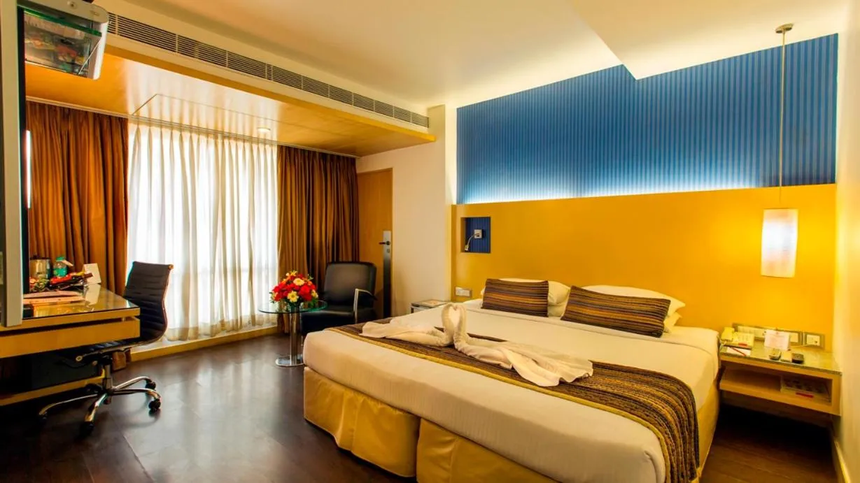 Bed in Ramee Guestline Hotel Dadar