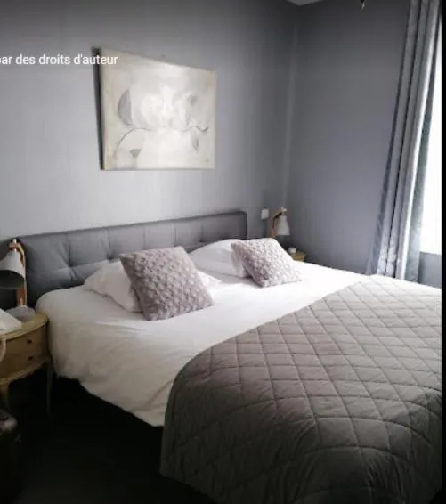 Bed in La Villa Bois Joli HOTEL RESTAURANT