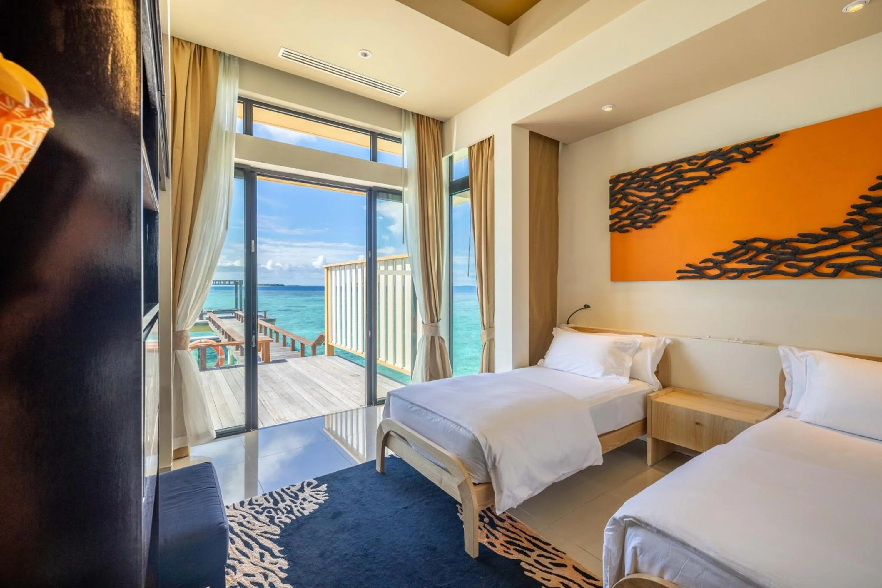 Bed in Angsana Velavaru - Enjoy 20 percent off Return Seaplane for Two guests on stays of 4 nights or more between 1 March to 23 December 2026