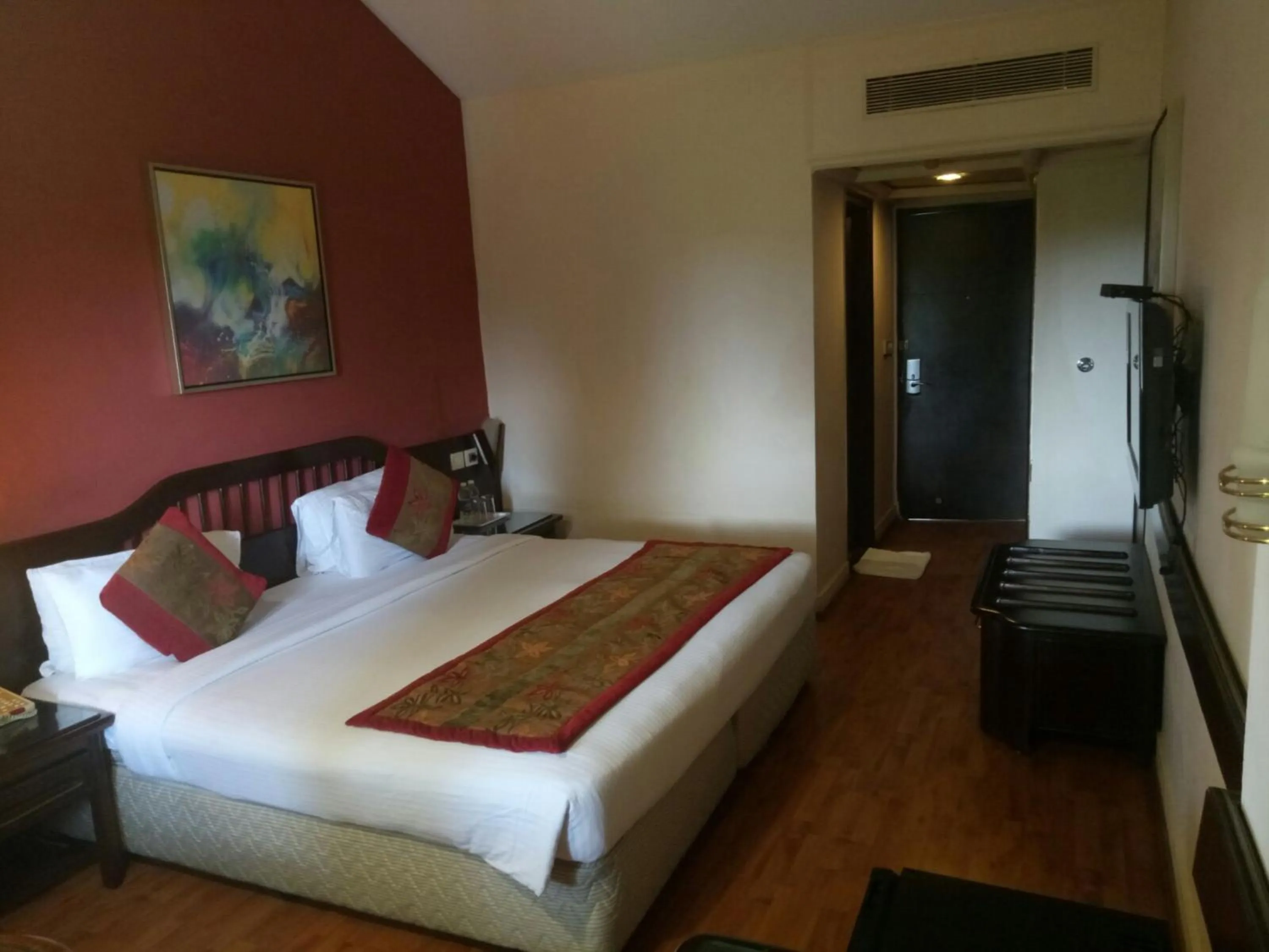 Bedroom, Bed in Ramee Guestline Hotel Bangalore