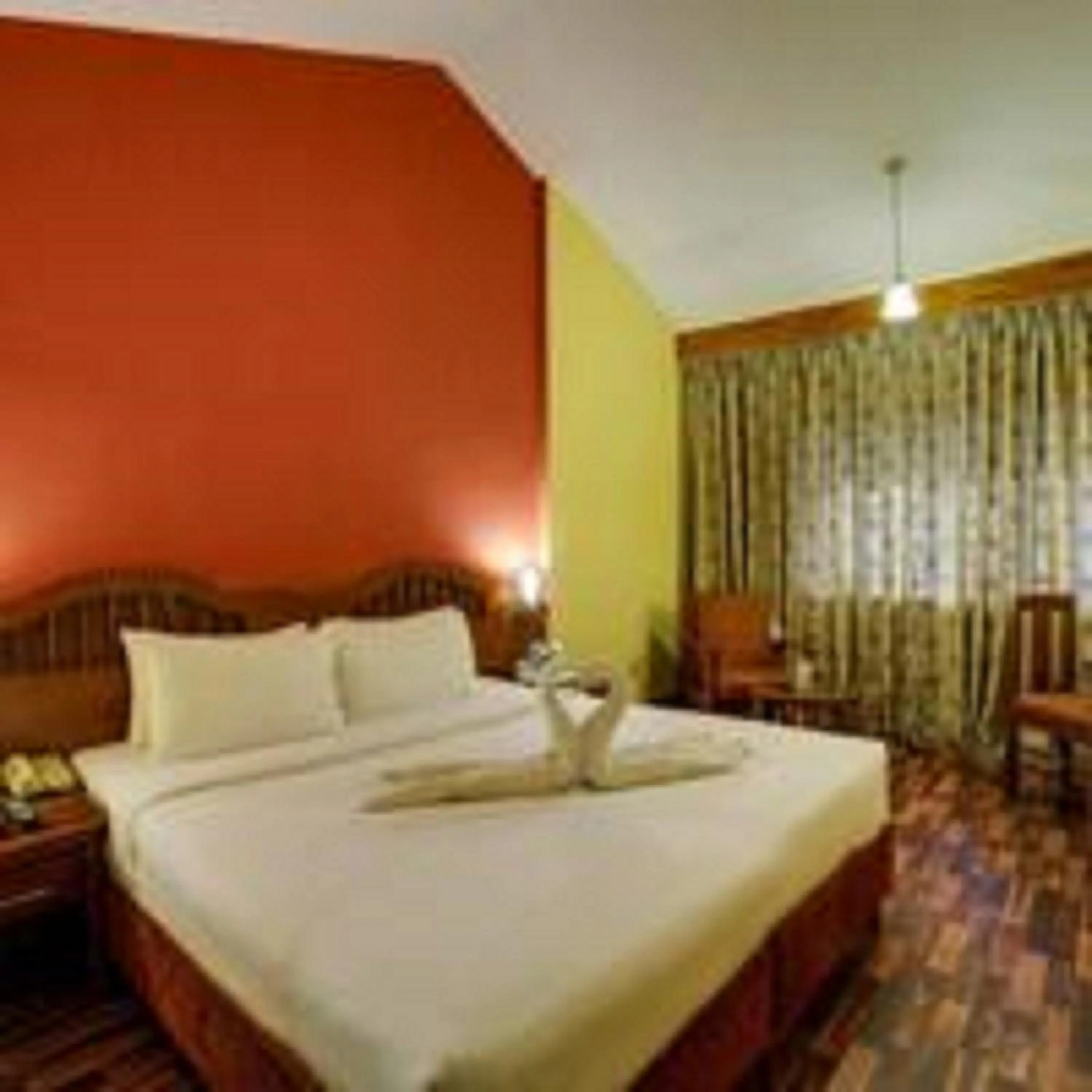 Bedroom, Bed in Ramee Guestline Hotel Bangalore