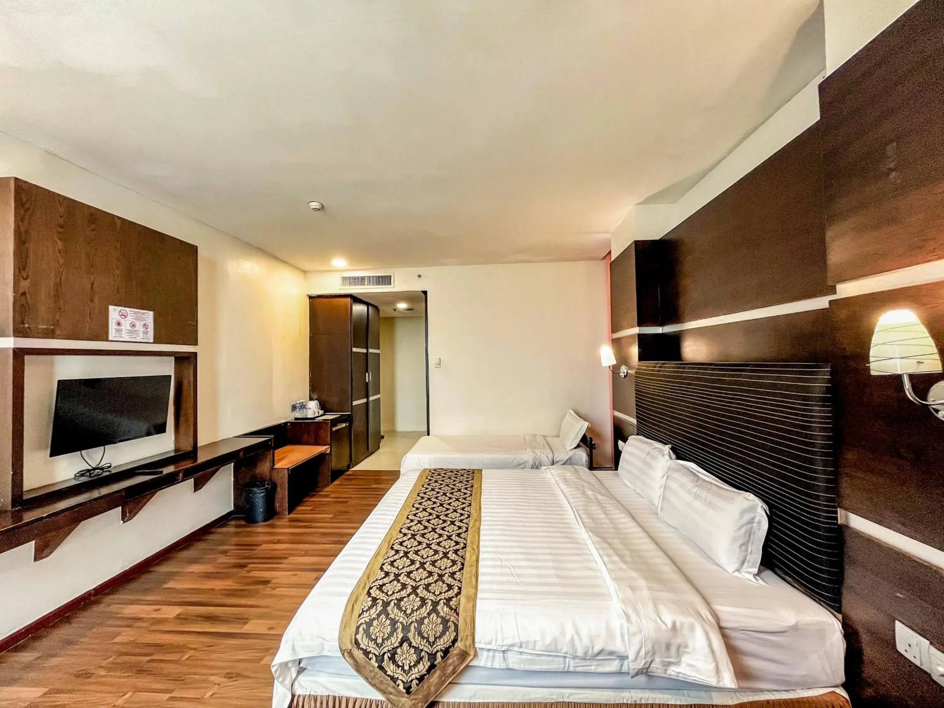 Bed in Courtyard Hotel 1Borneo Bed in Courtyard Hotel 1Borneo