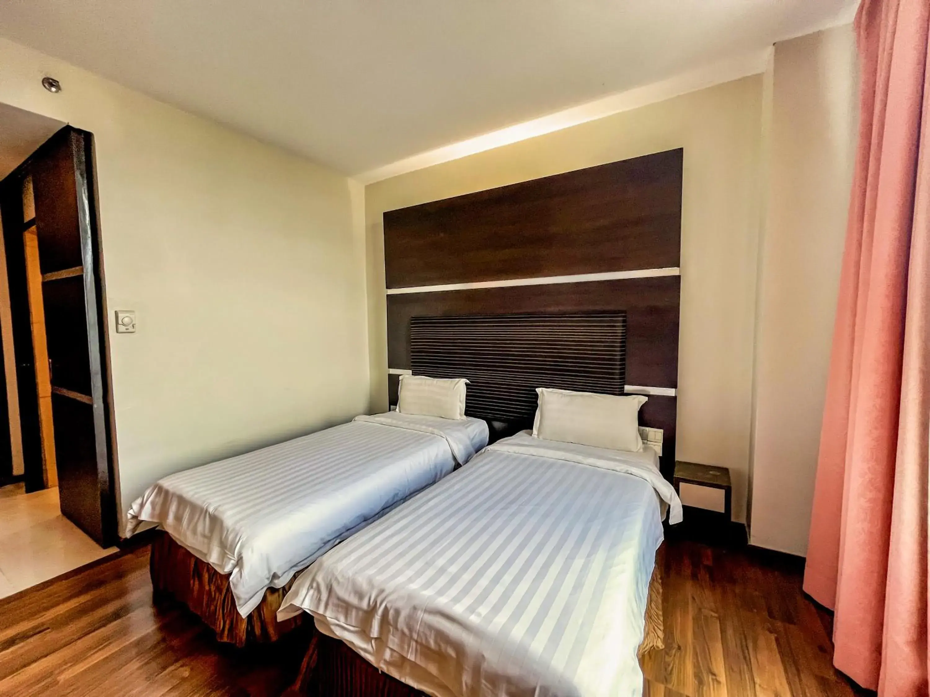 Bed in Courtyard Hotel 1Borneo Bed in Courtyard Hotel 1Borneo