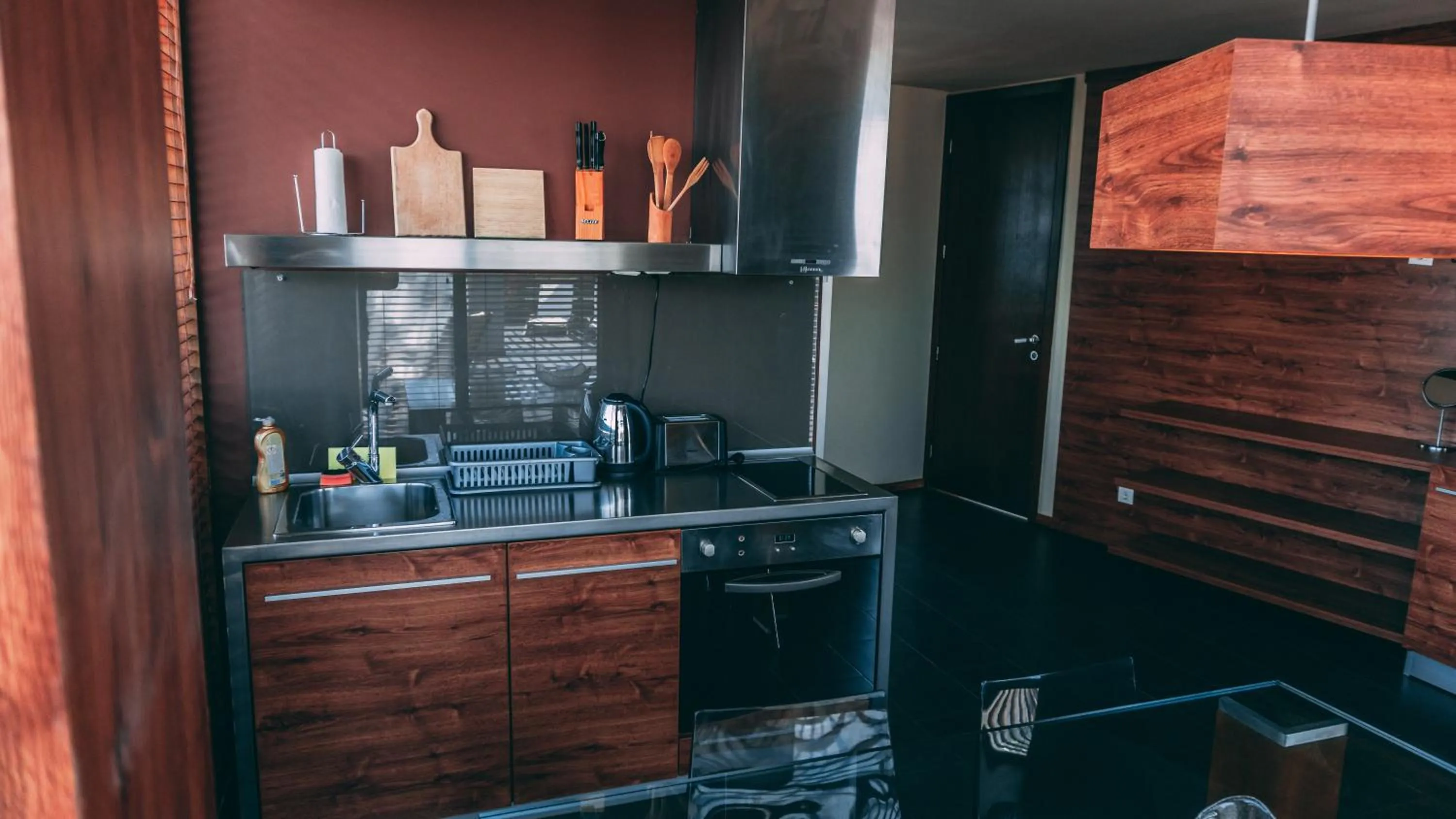 Kitchen or kitchenette in Design Hotel Logatero