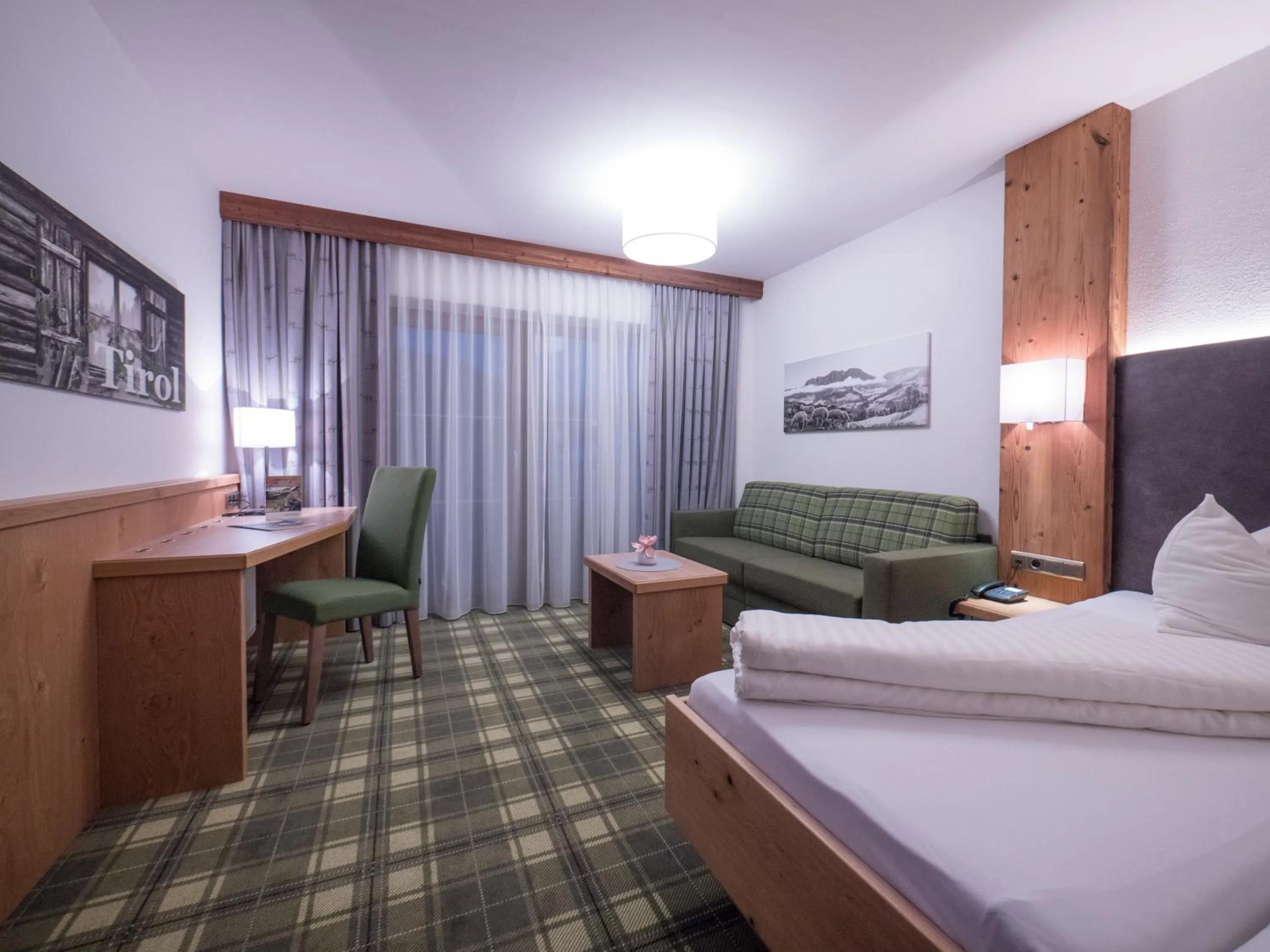 Photo of the whole room, Bed in Hotel Alphof Alpbach