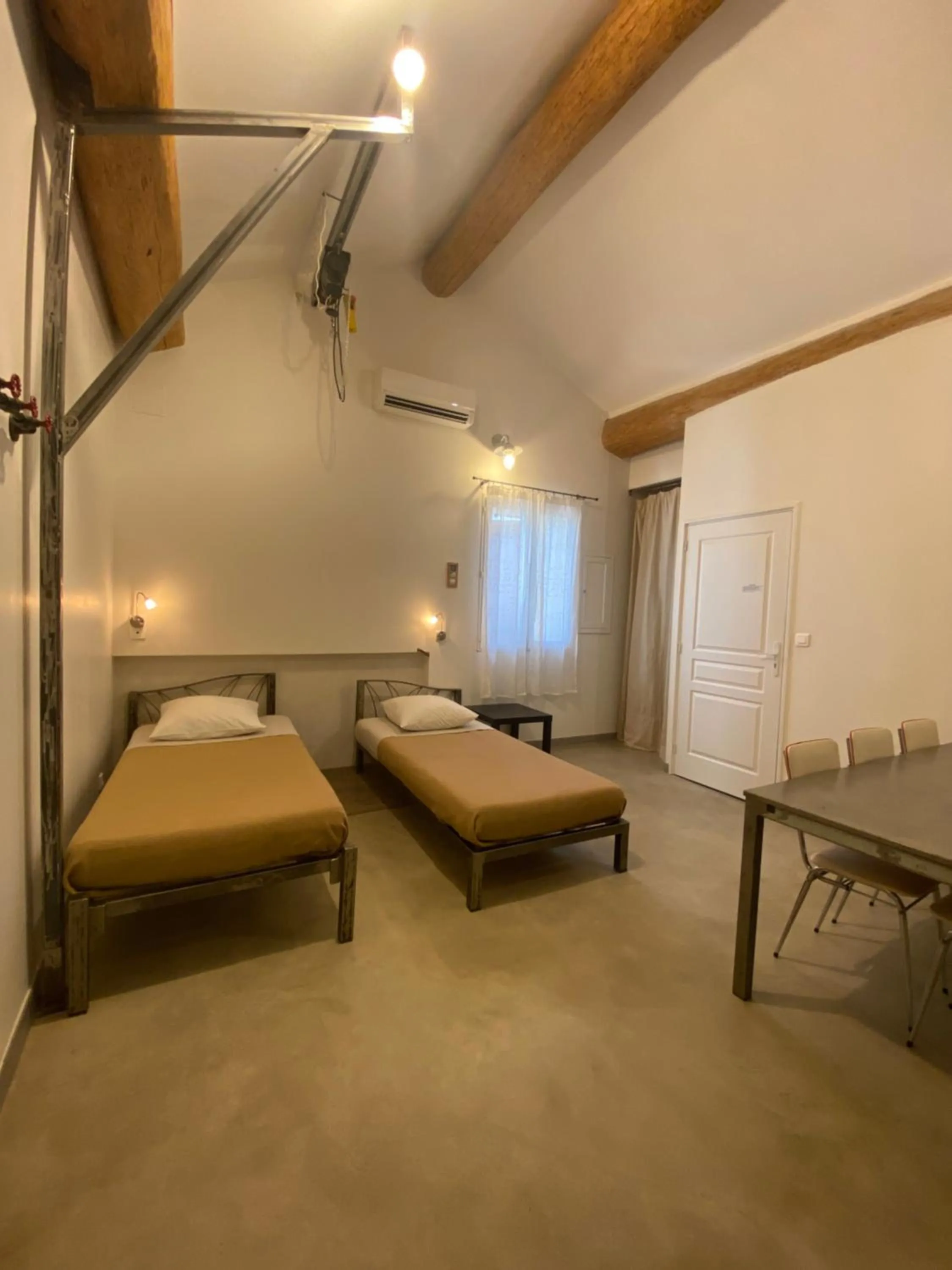 Bed in L'atelier B&B