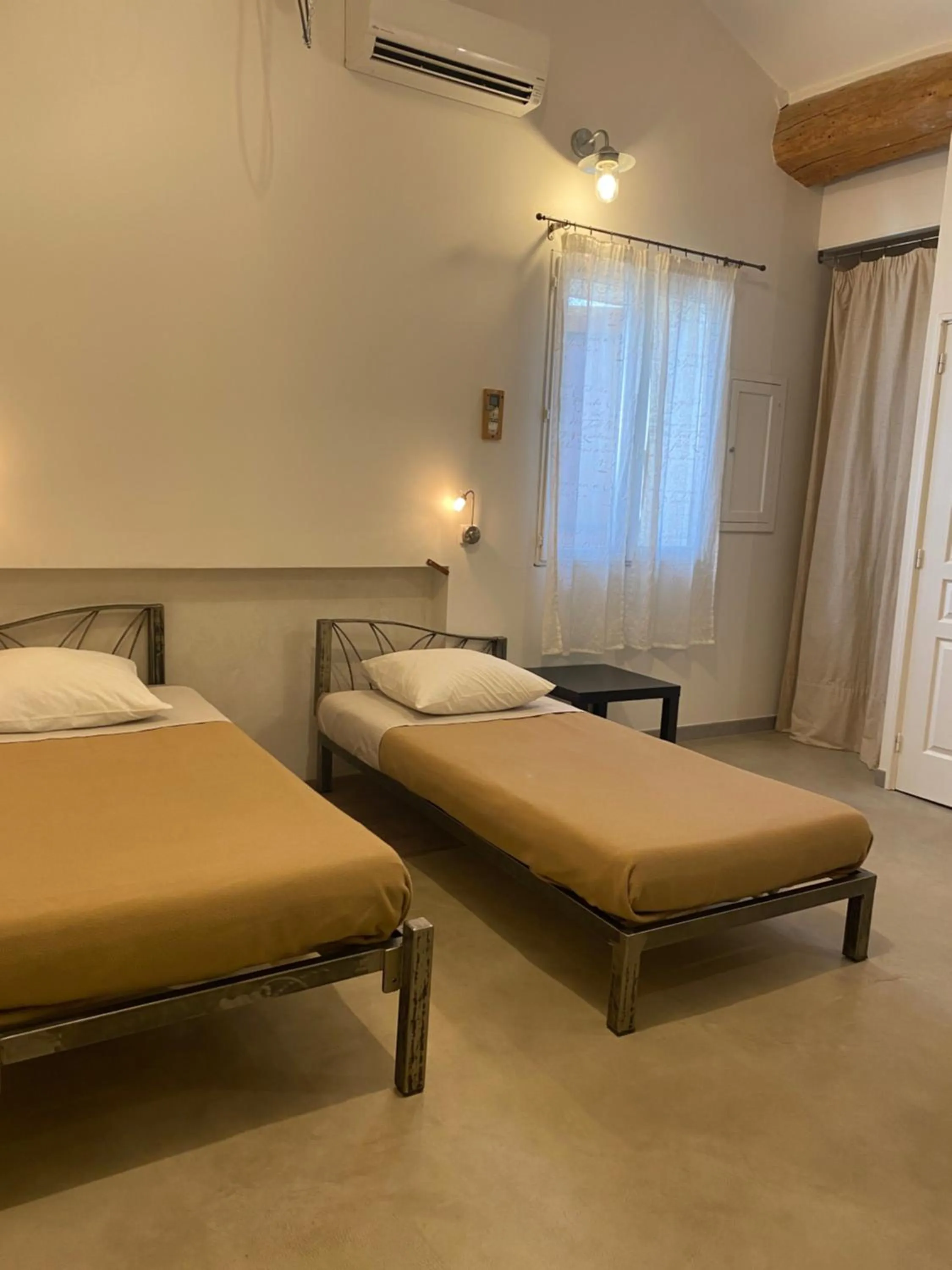 Bed in L'atelier B&B