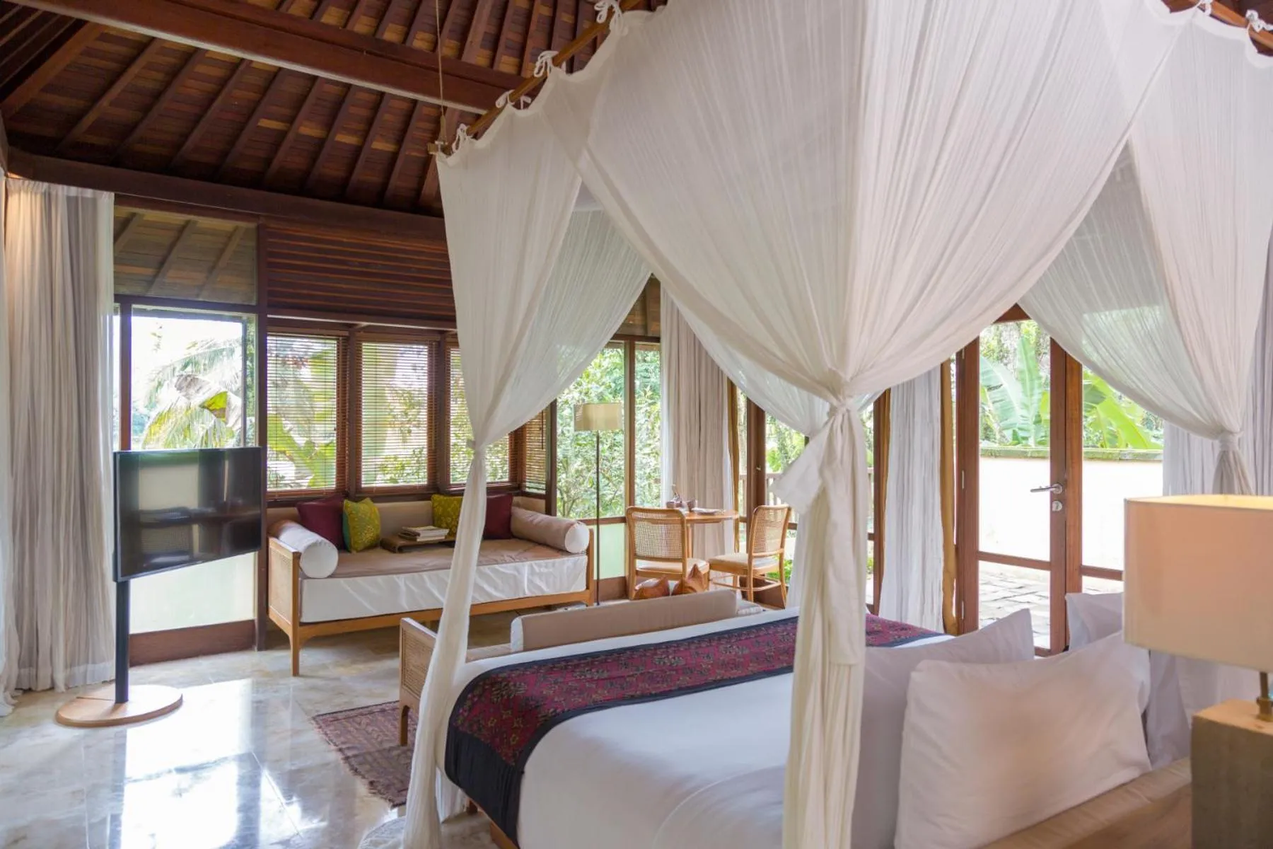 Bed in Komaneka at Tanggayuda Ubud