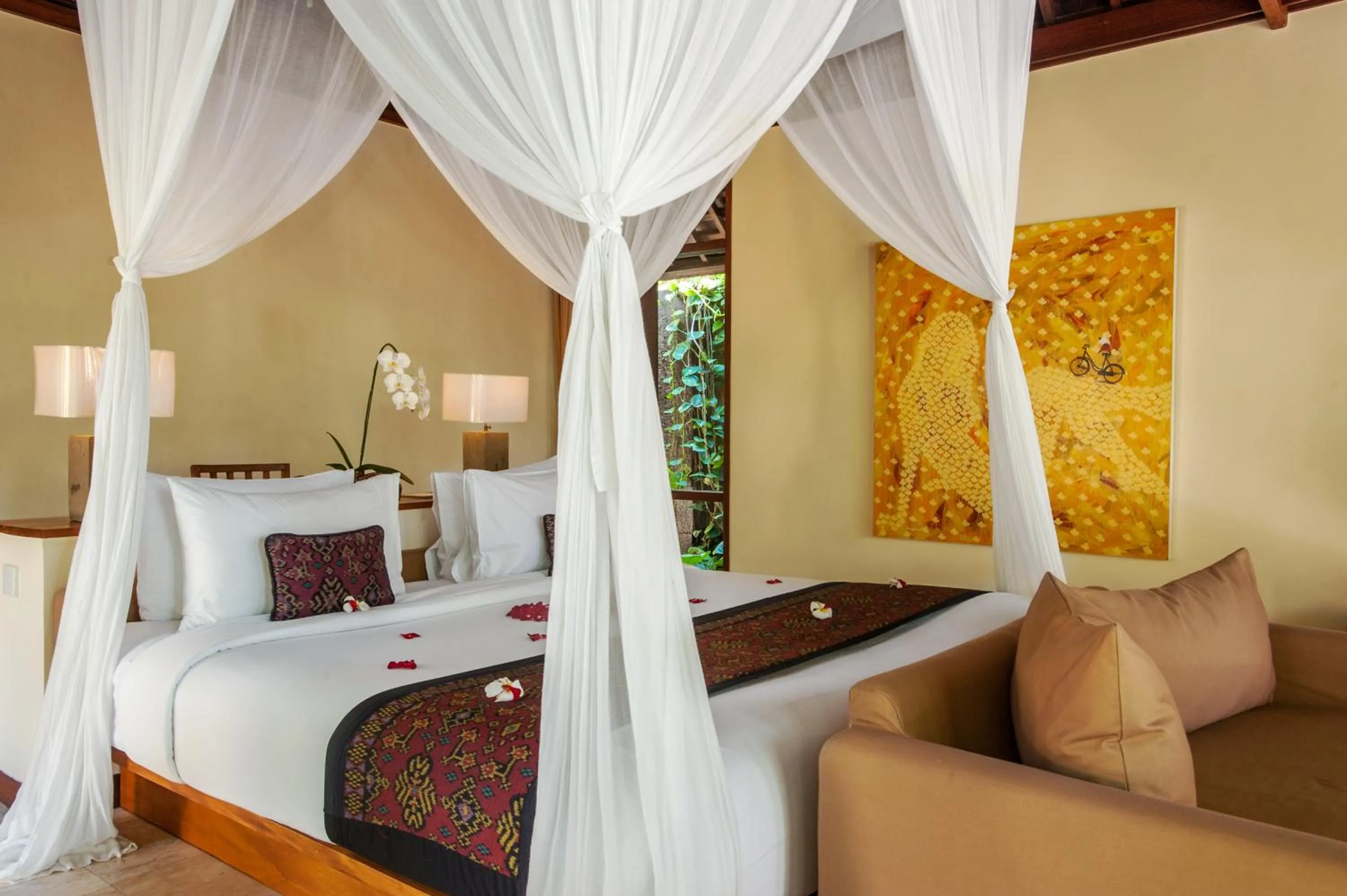 Bed in Komaneka at Tanggayuda Ubud