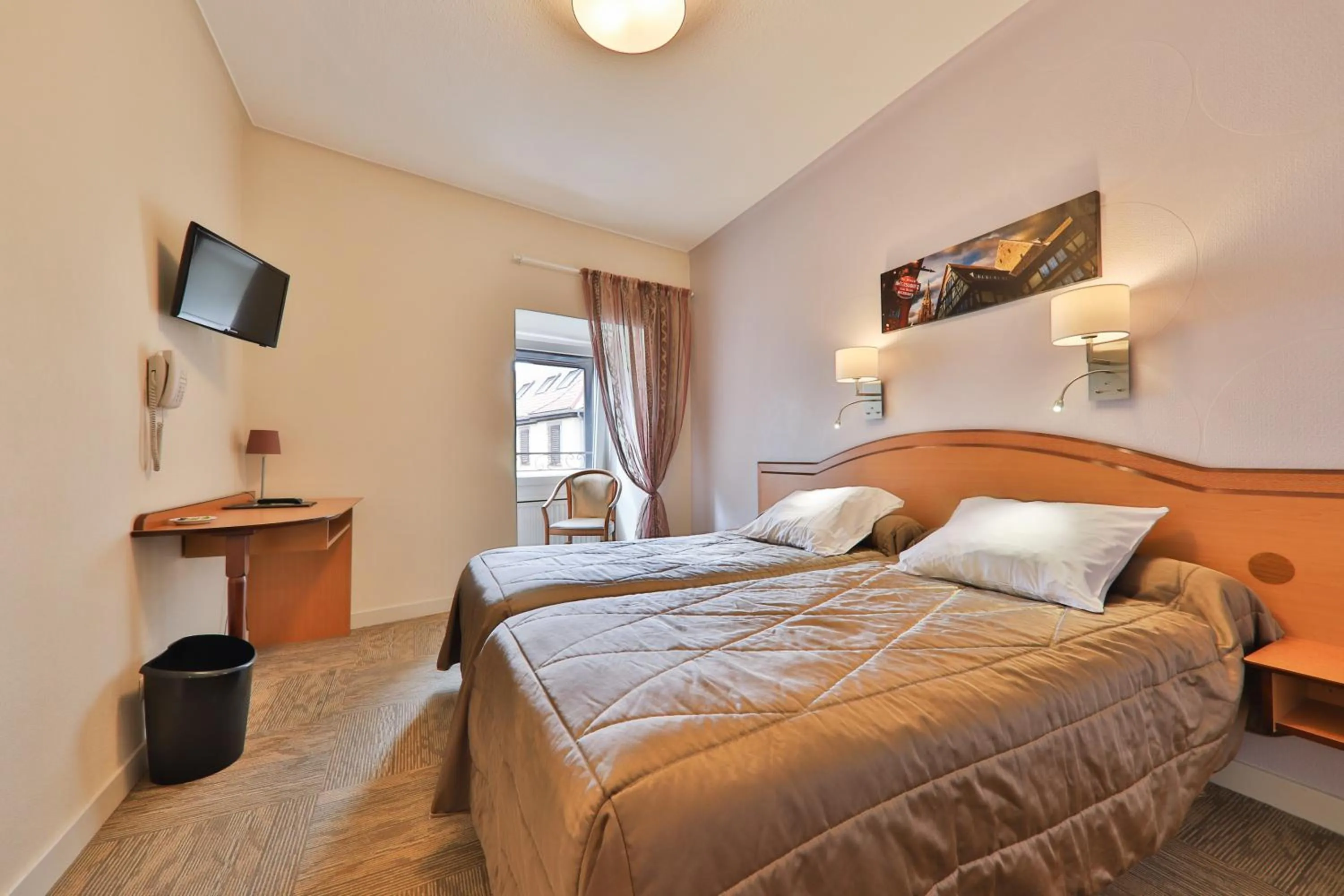 Photo of the whole room, Bed in Hôtel Bar Des Vosges