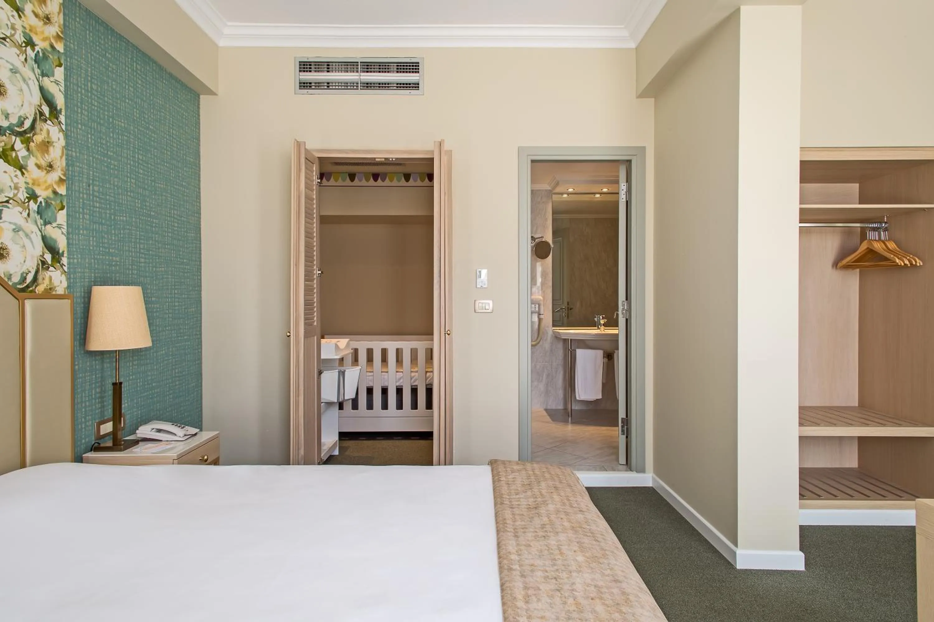 Bed in Airotel Stratos Vassilikos Hotel