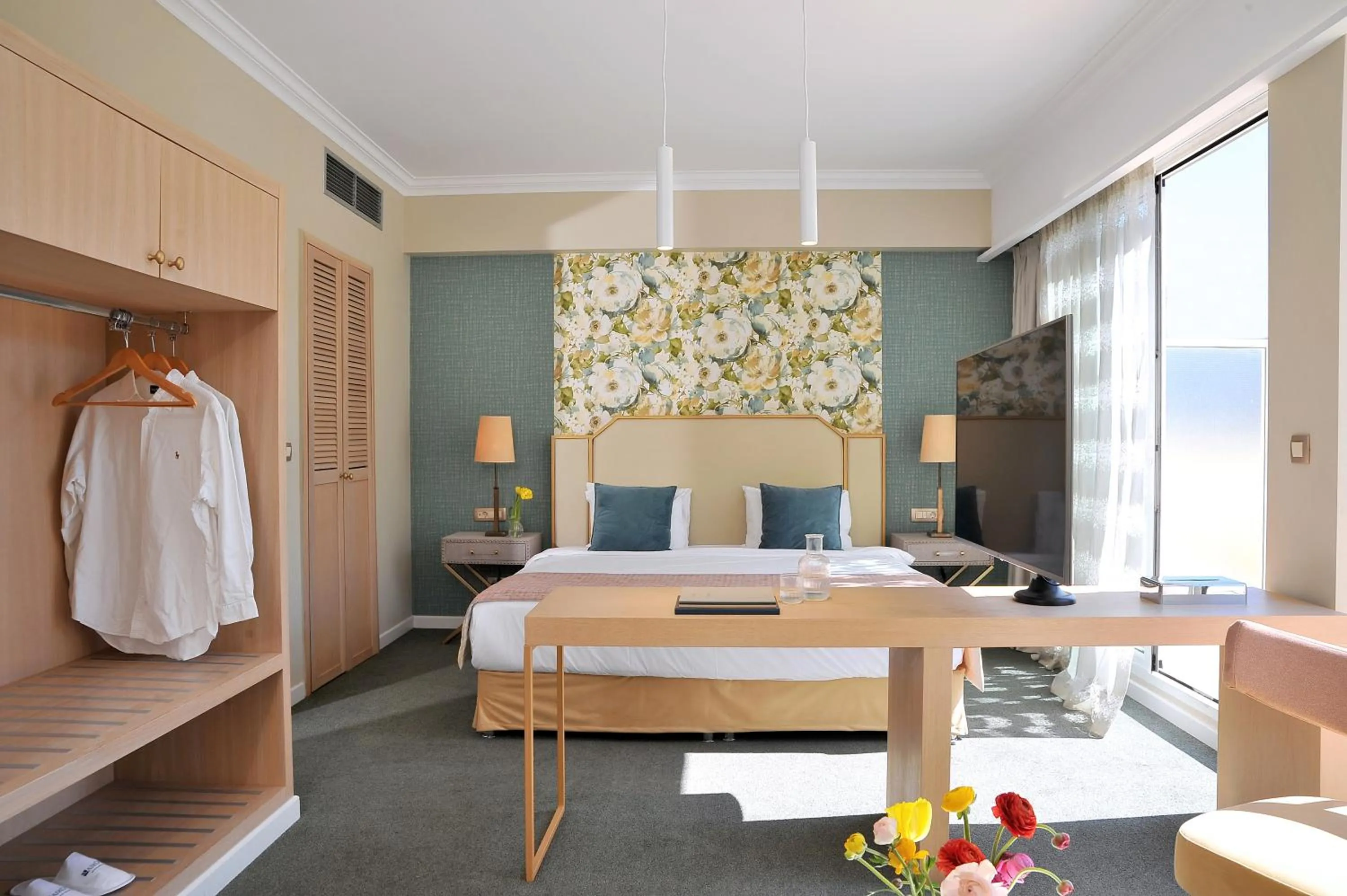 Bed in Airotel Stratos Vassilikos Hotel