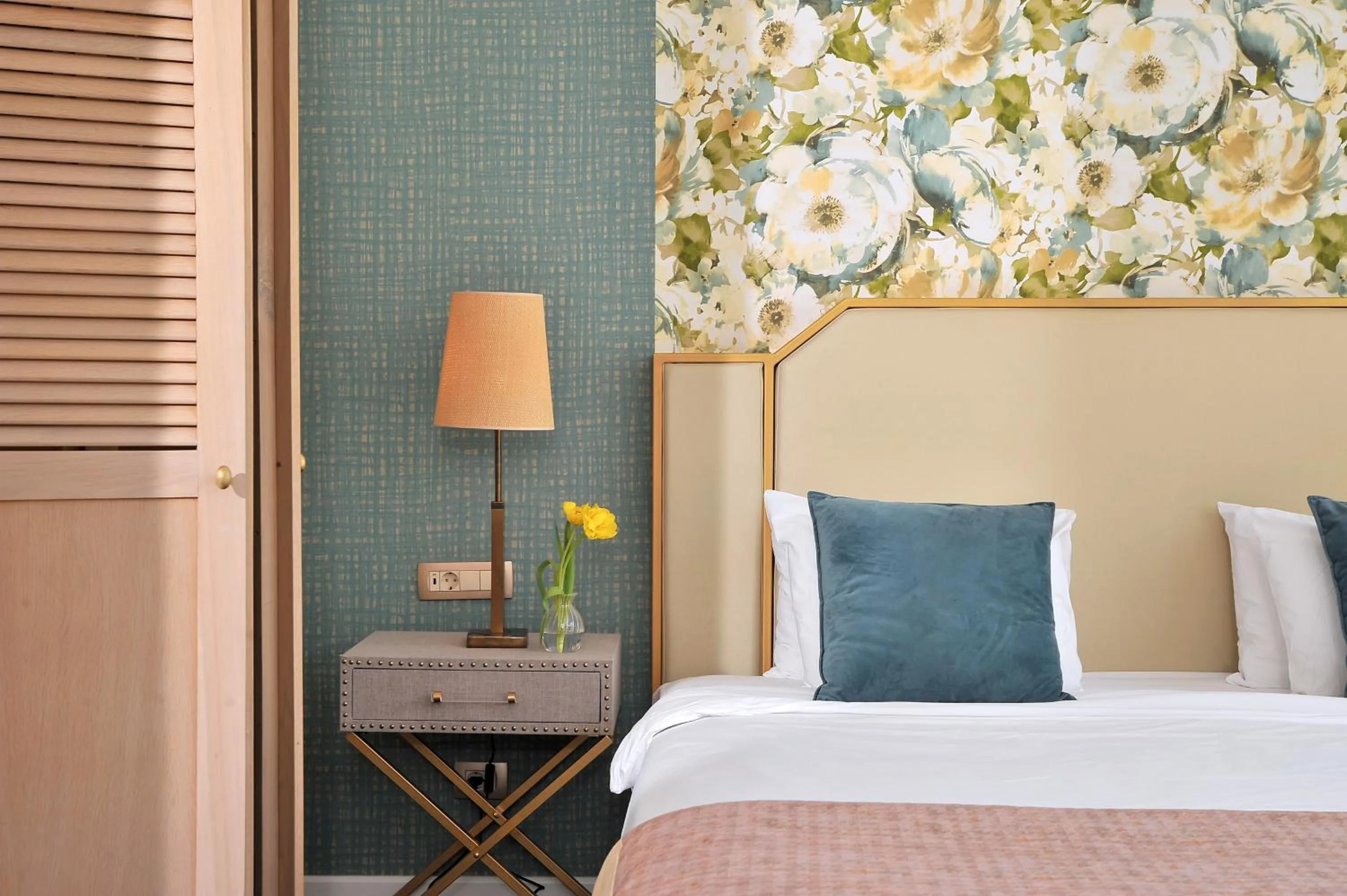 Bed in Airotel Stratos Vassilikos Hotel