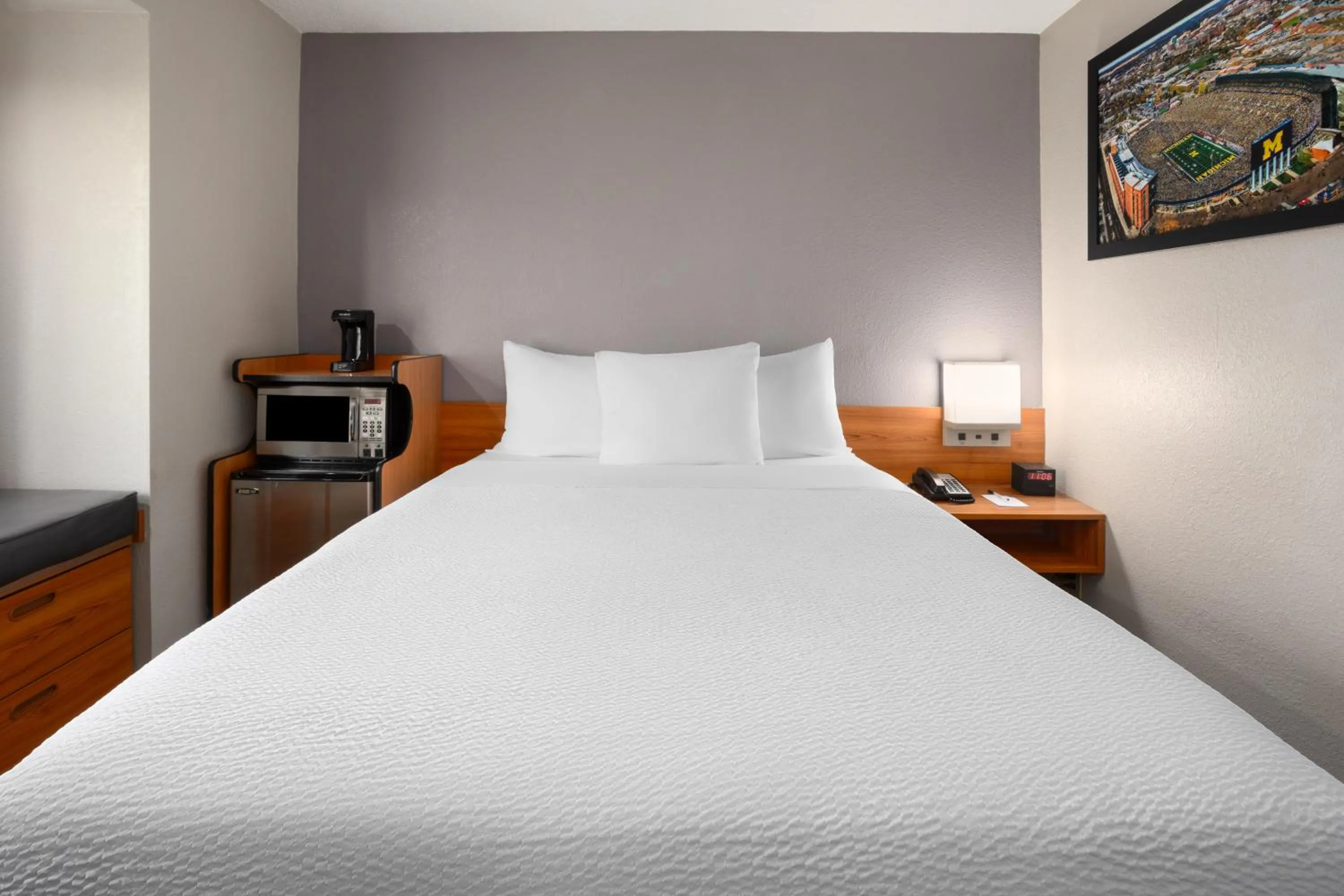 Bed in Microtel Inn & Suites by Wyndham Ann Arbor