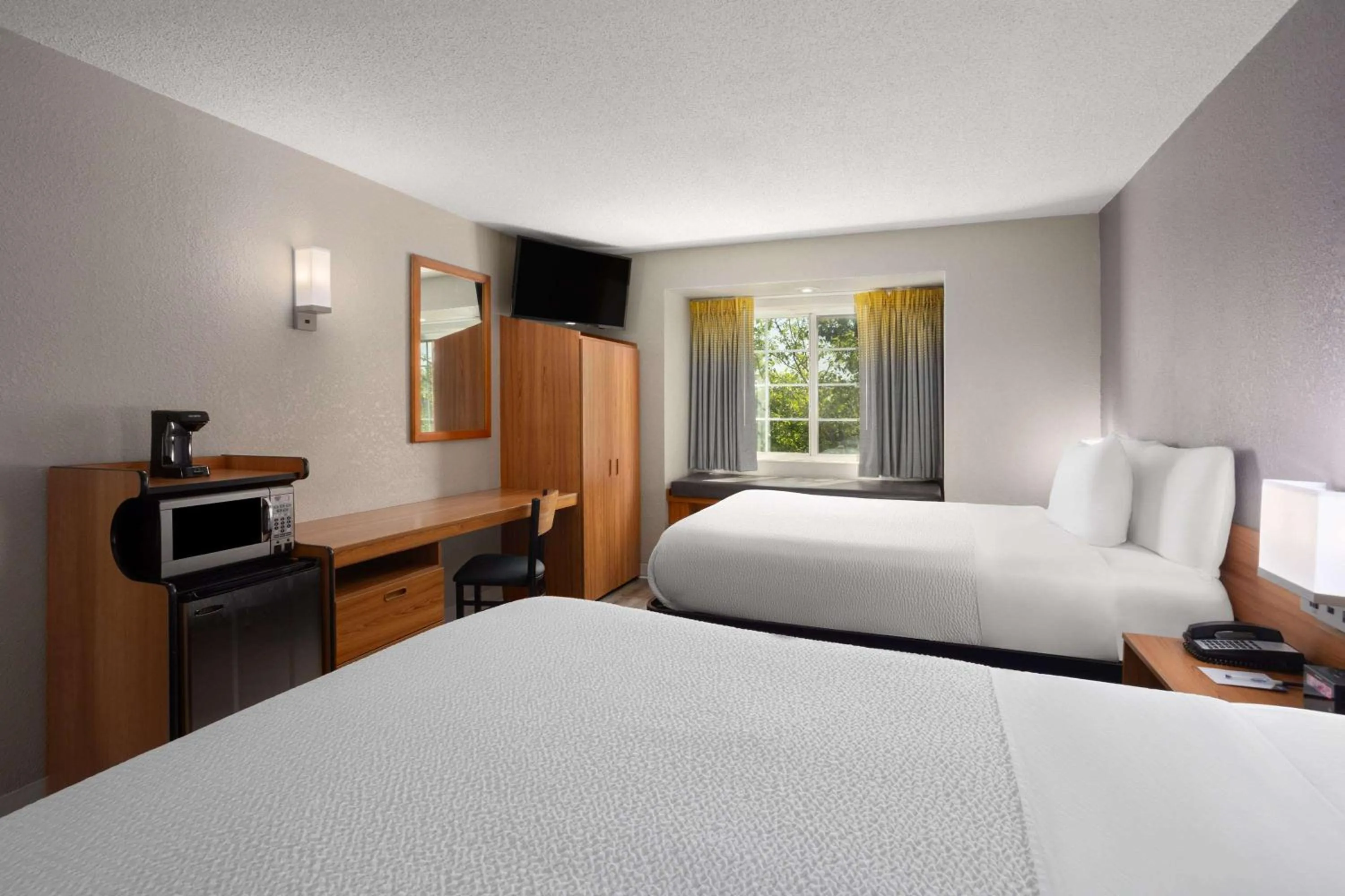 Photo of the whole room, Bed in Microtel Inn & Suites by Wyndham Ann Arbor