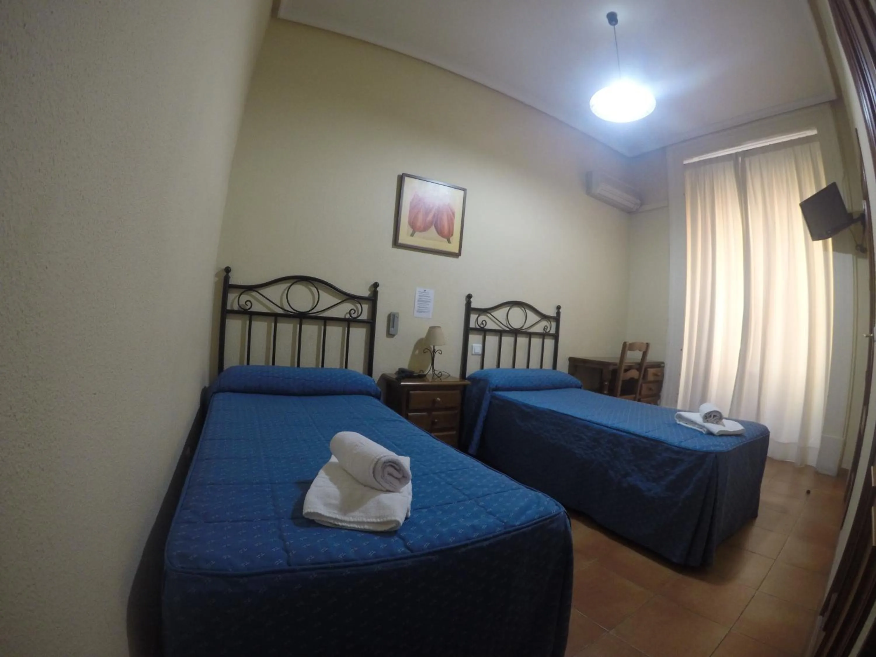 Bathroom, Bed in Hostal El Pilar