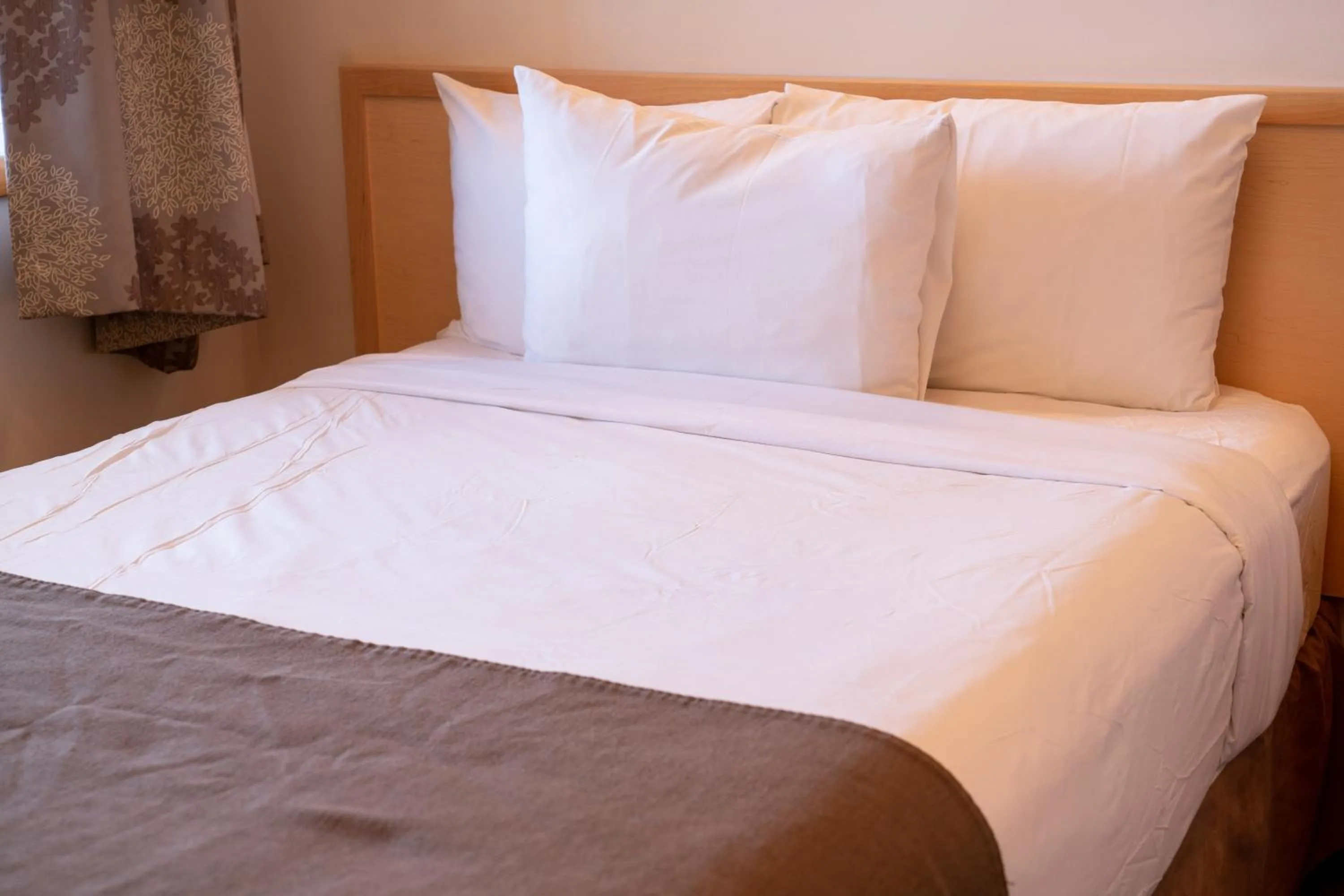 Bed in Rocky Mountain Ski Lodge