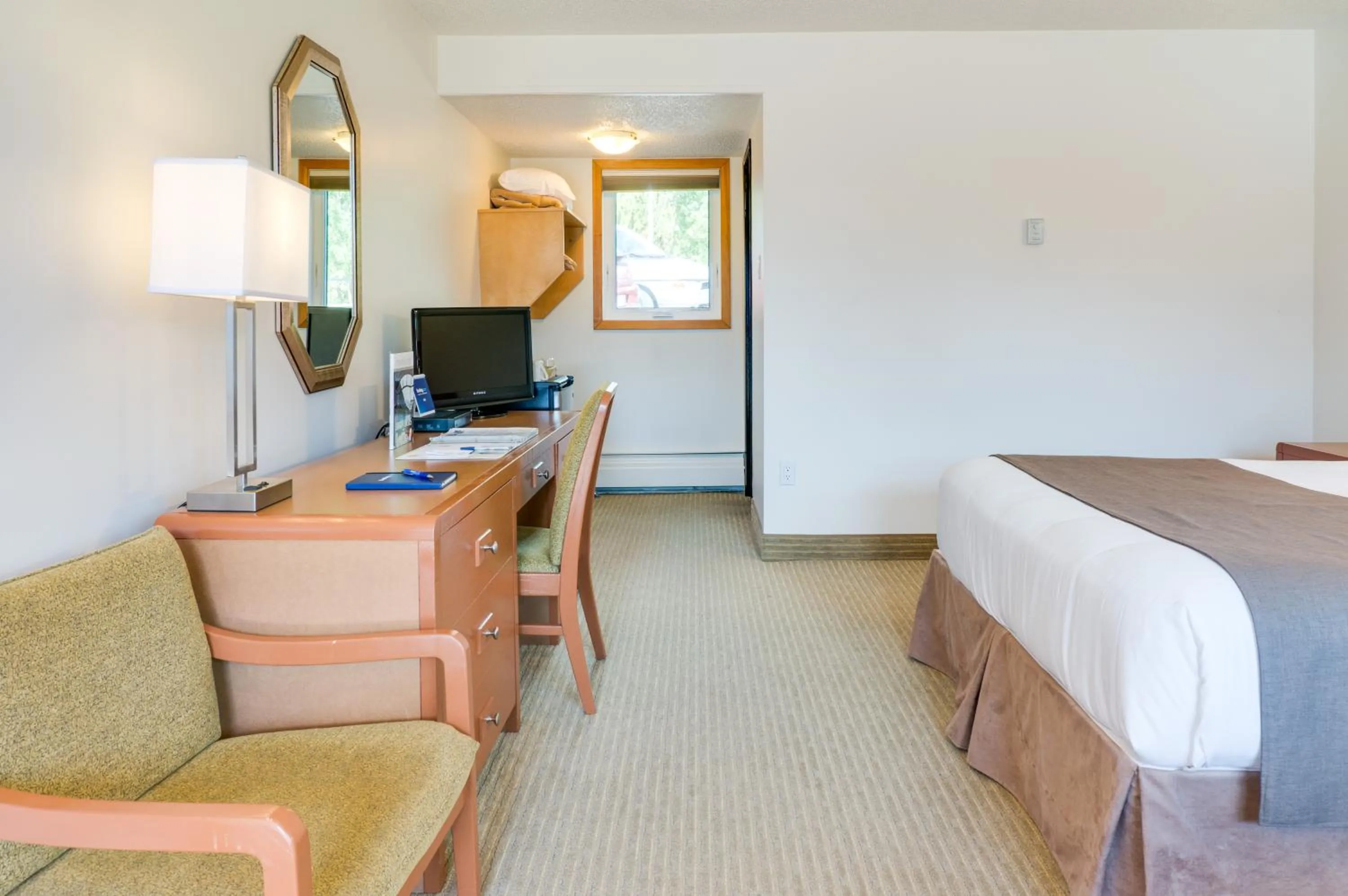 Bed in Rocky Mountain Ski Lodge