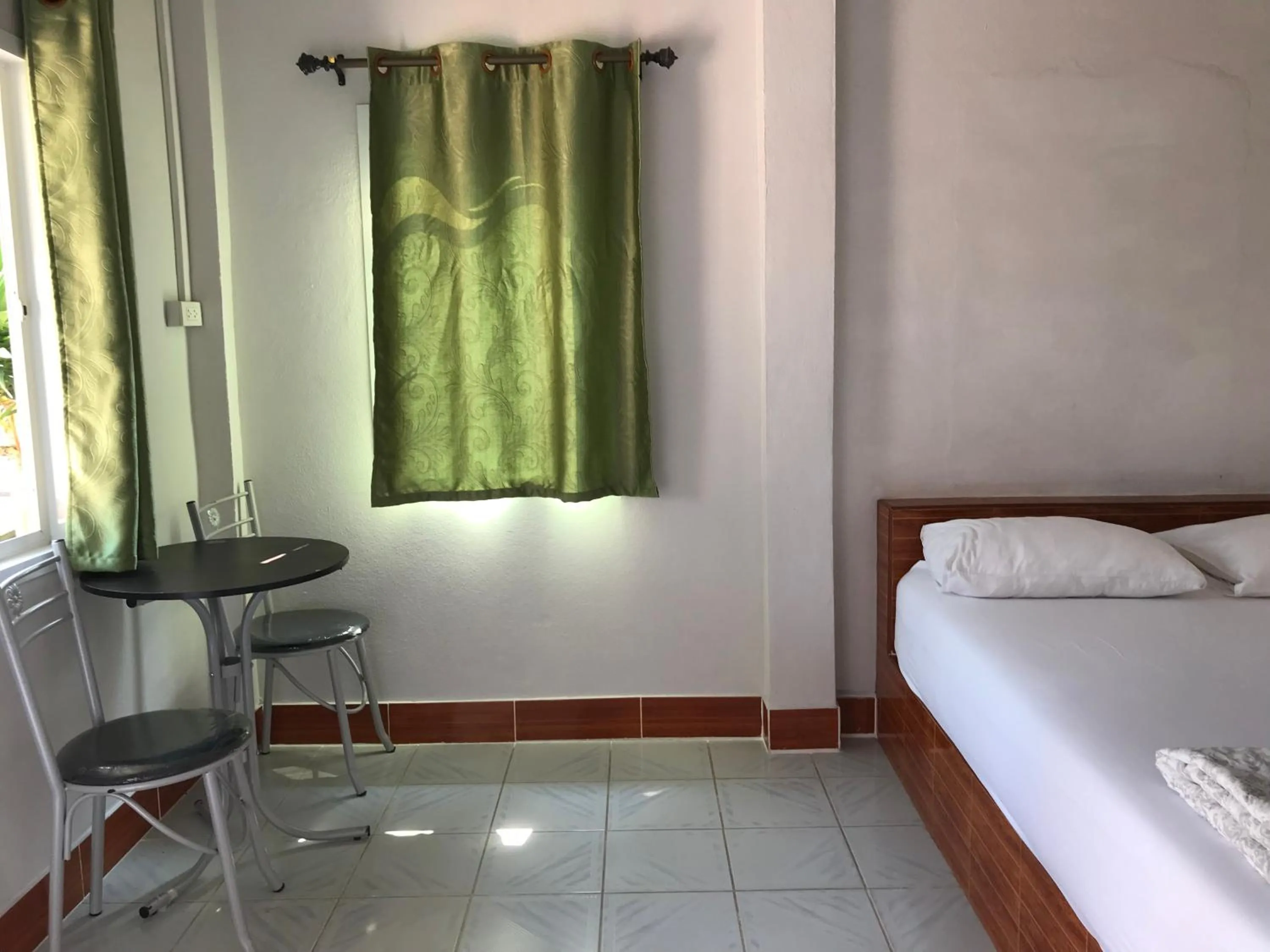 Bed in Rubtawan Sichang Resort