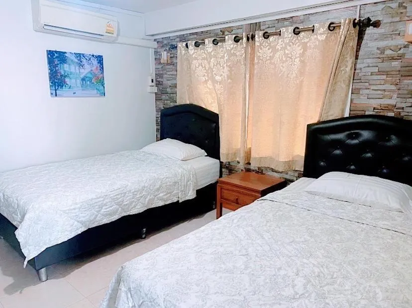 Bed in Rubtawan Sichang Resort