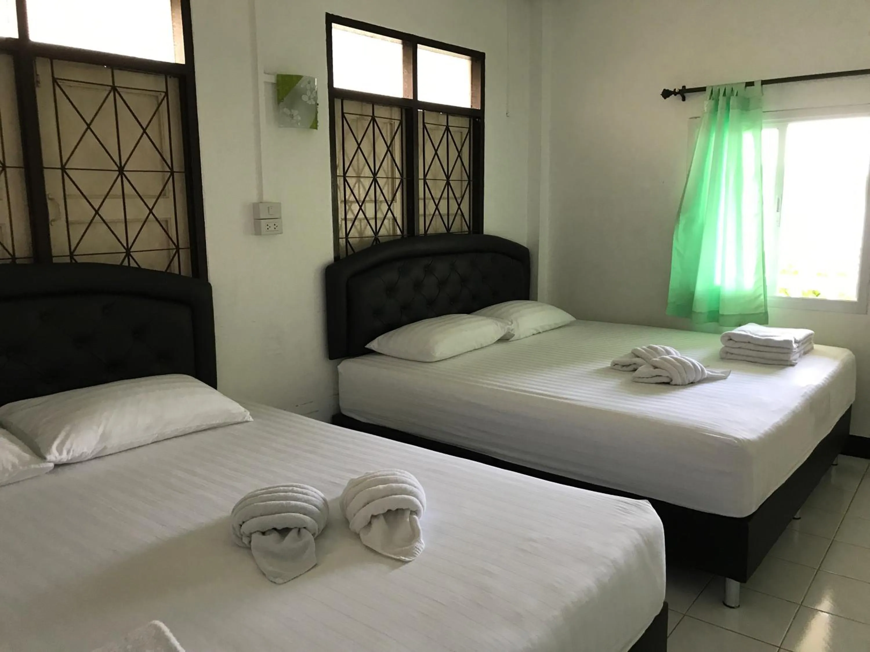 Bed in Rubtawan Sichang Resort
