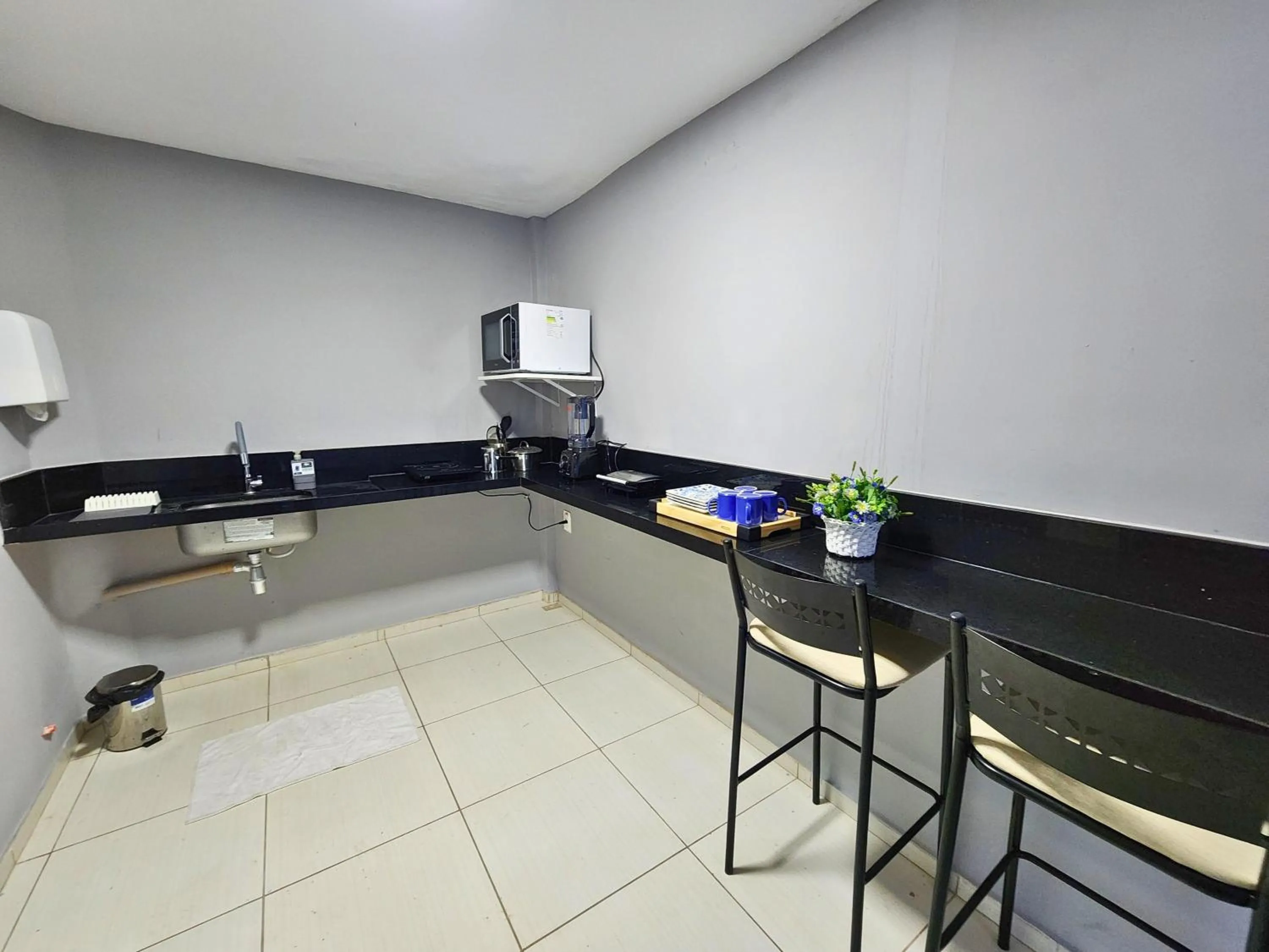 Kitchen or kitchenette in JR Hotel