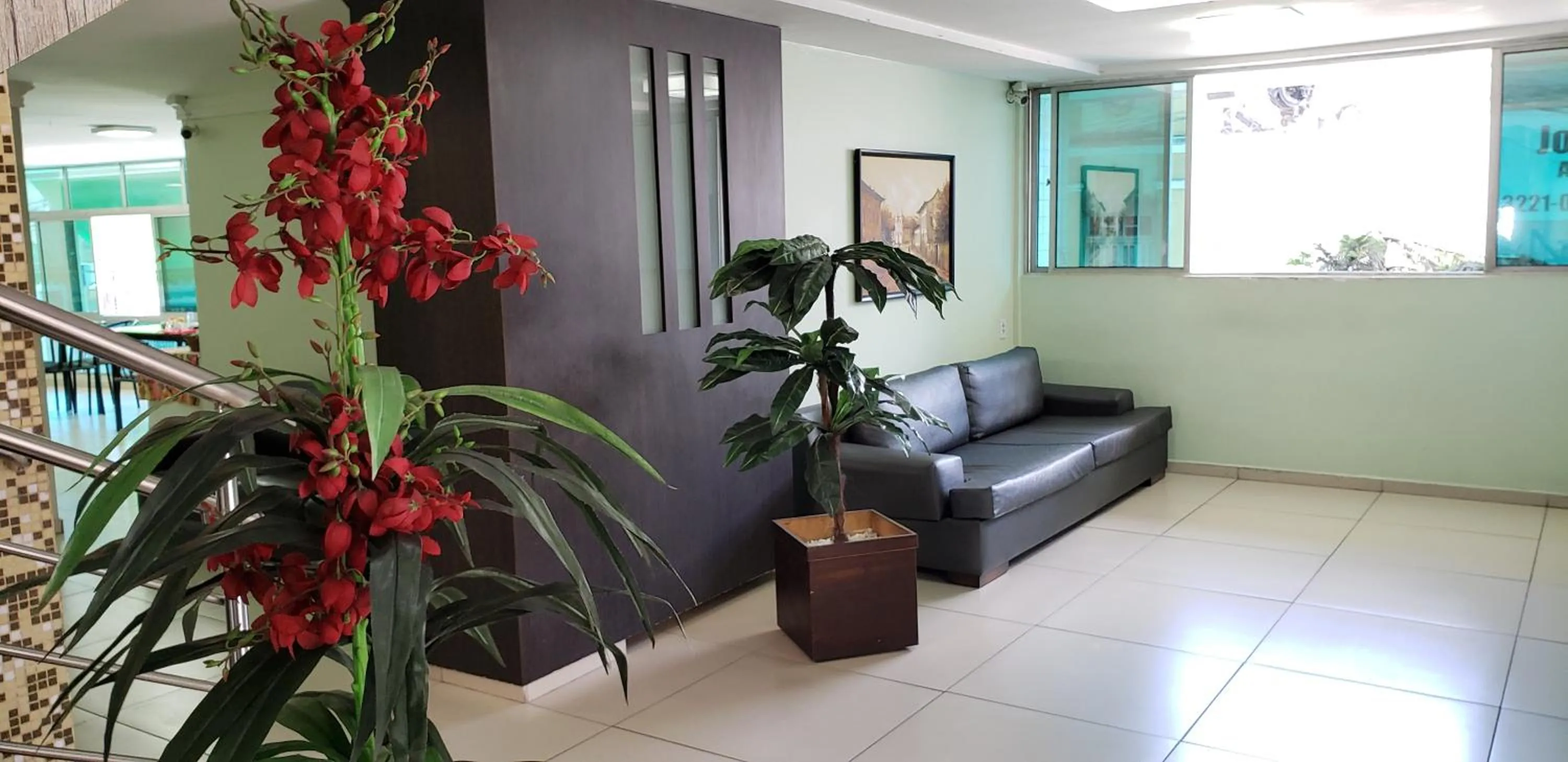 Communal lounge/ TV room in Guarany Hotel Express