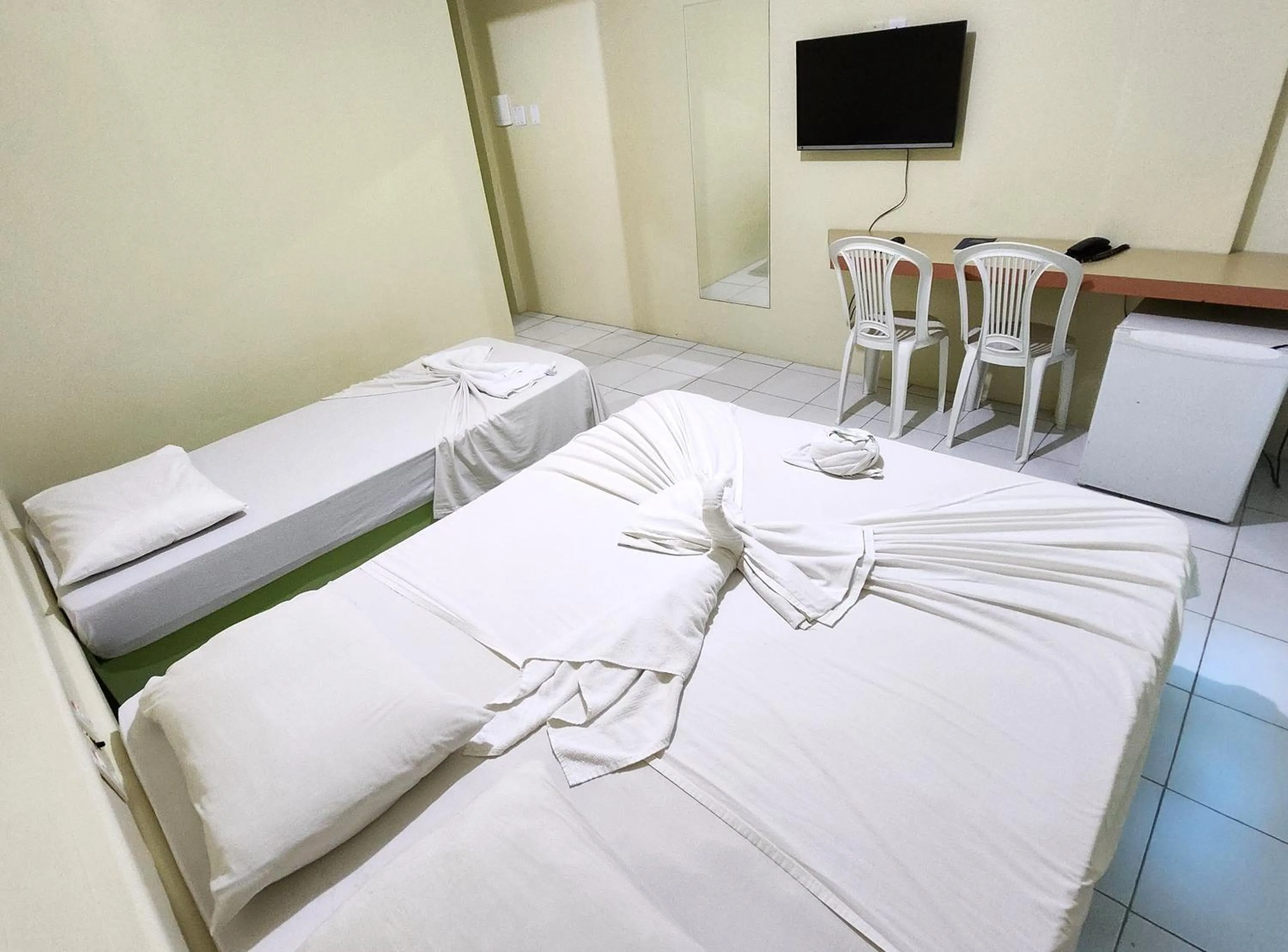 Bed in Guarany Hotel Express