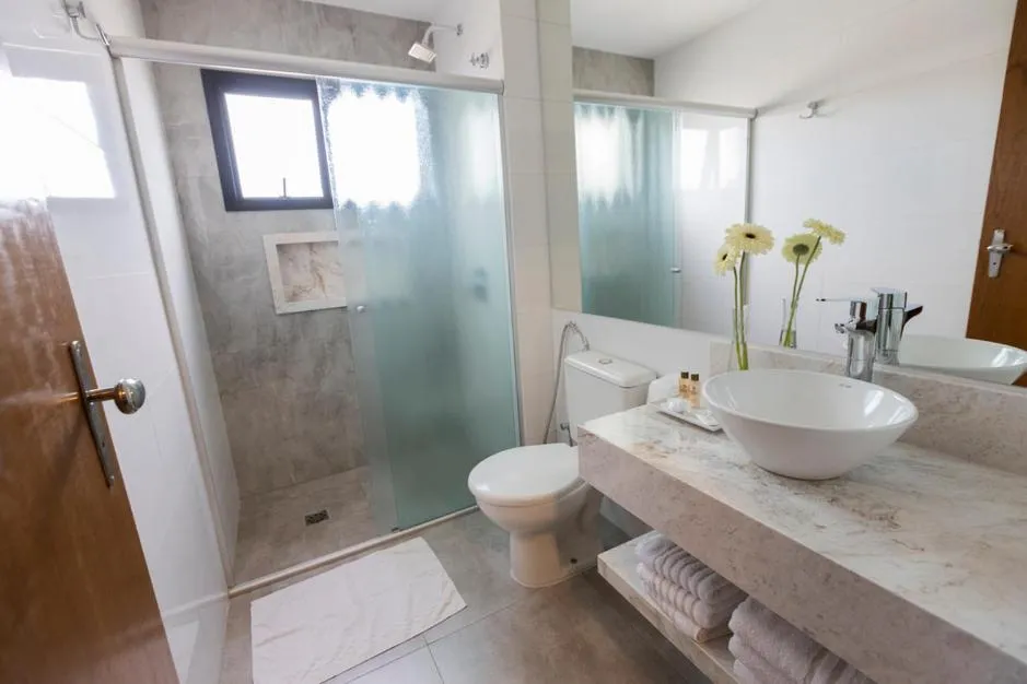 Shower in Nadai Confort Hotel e Spa