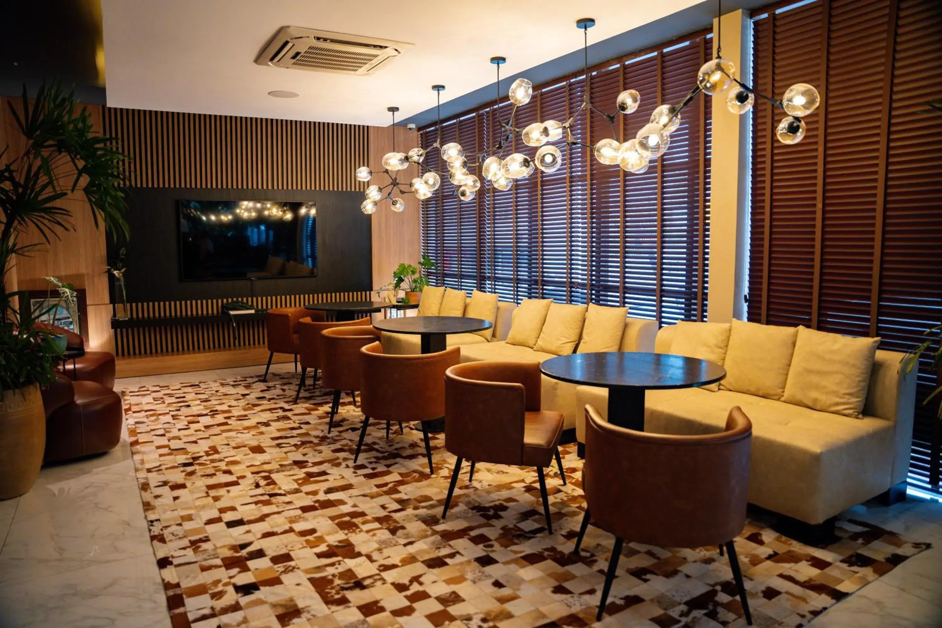 Living room in Nadai Confort Hotel e Spa Living room in Nadai Confort Hotel e Spa