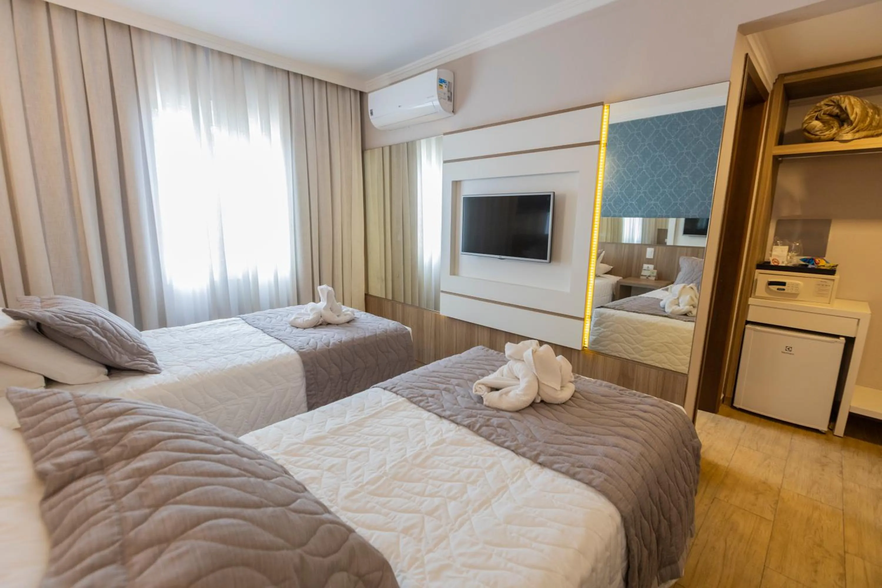 Bed in Nadai Confort Hotel e Spa