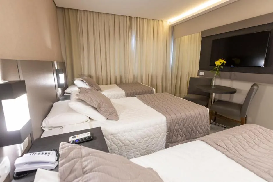 Bed in Nadai Confort Hotel e Spa