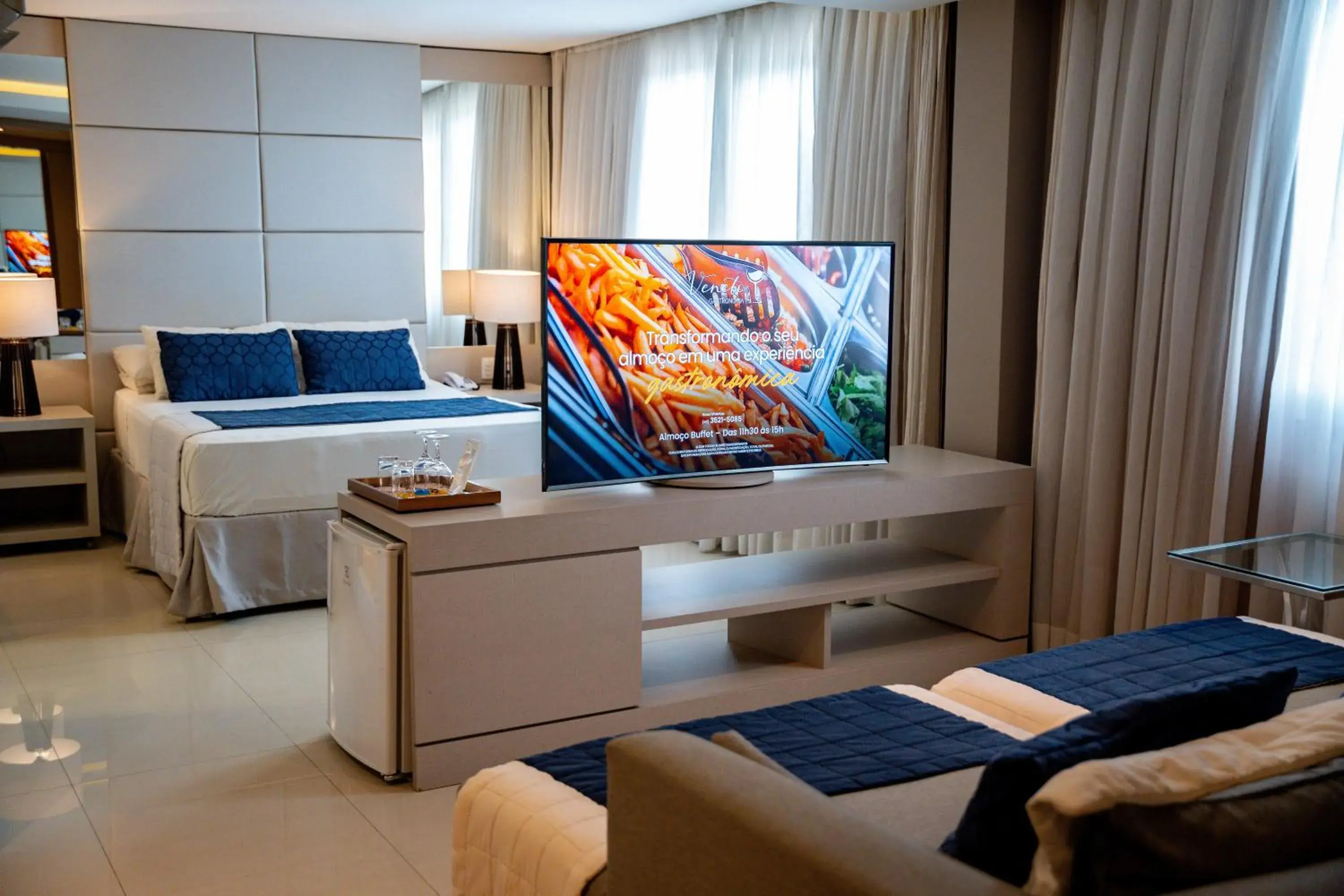 Communal lounge/ TV room, Bed in Nadai Confort Hotel e Spa Communal lounge/ TV room, Bed in Nadai Confort Hotel e Spa