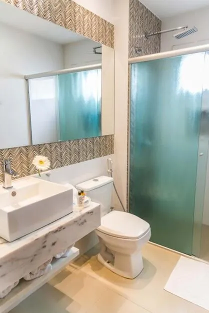 Shower in Nadai Confort Hotel e Spa