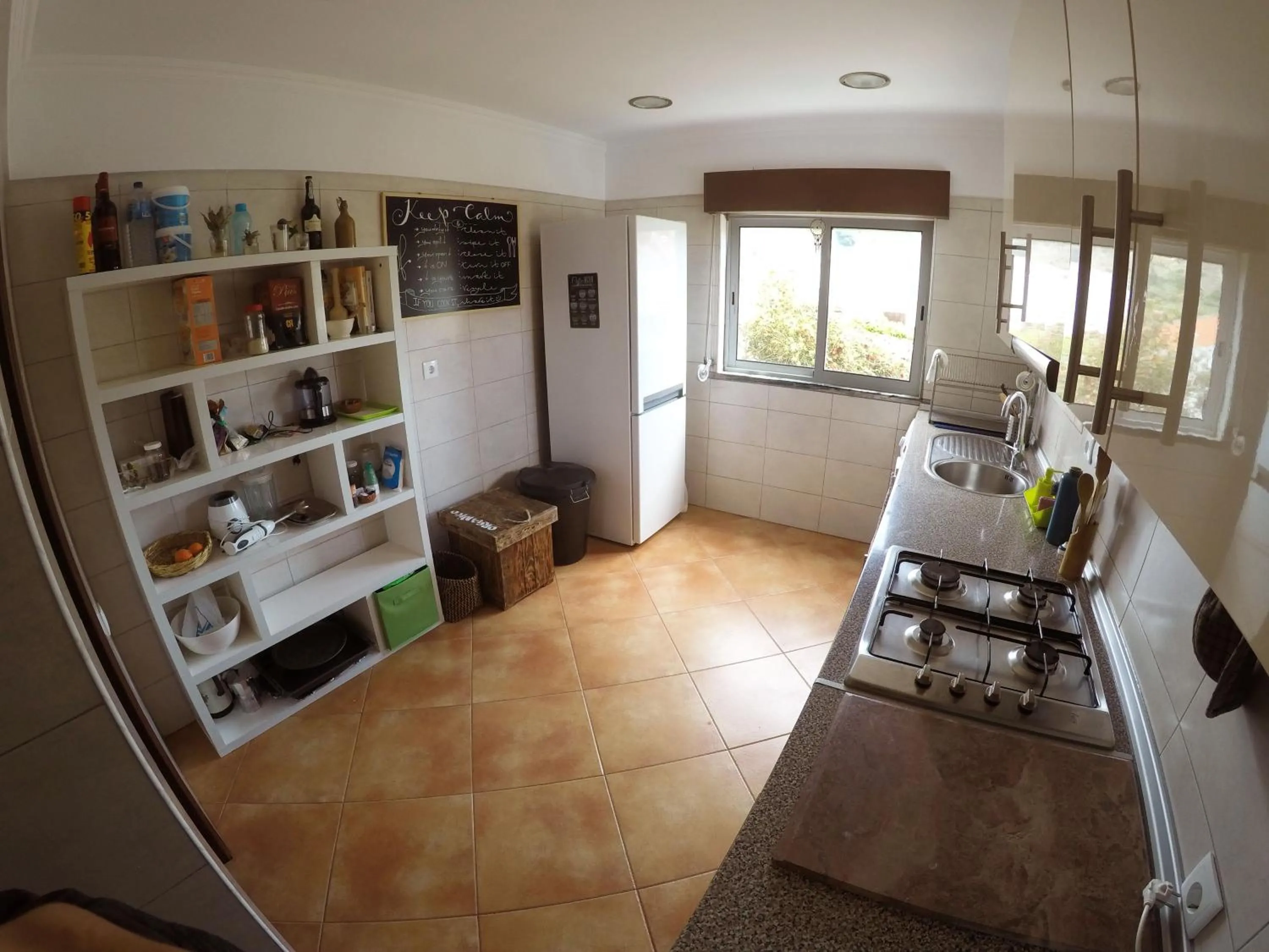 Communal kitchen in Natural Mystic Hostel