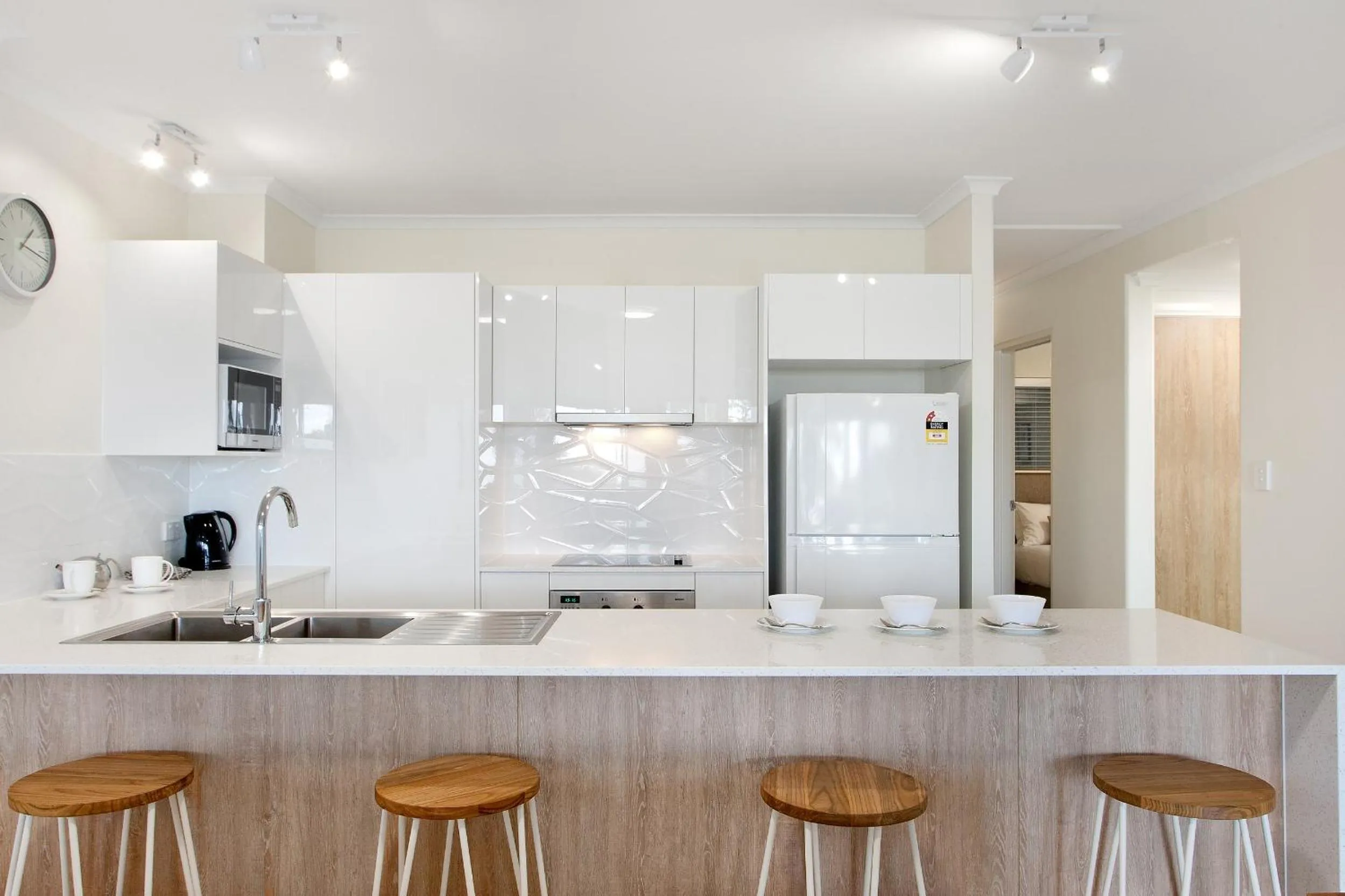 Kitchen or kitchenette in Offshore Noosa Resort