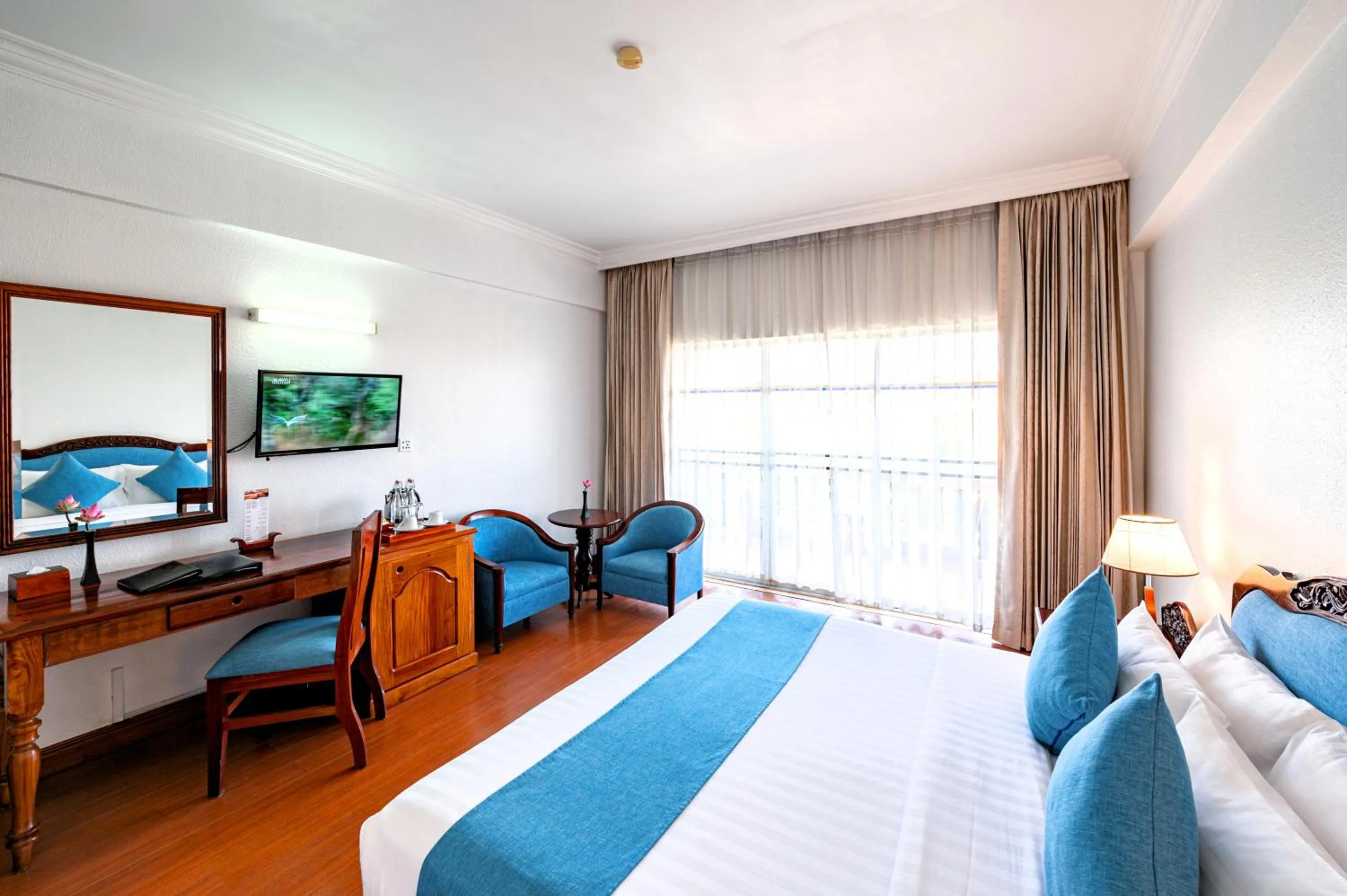 Photo of the whole room, Bed in Hotel Somadevi Angkor Resort & Spa