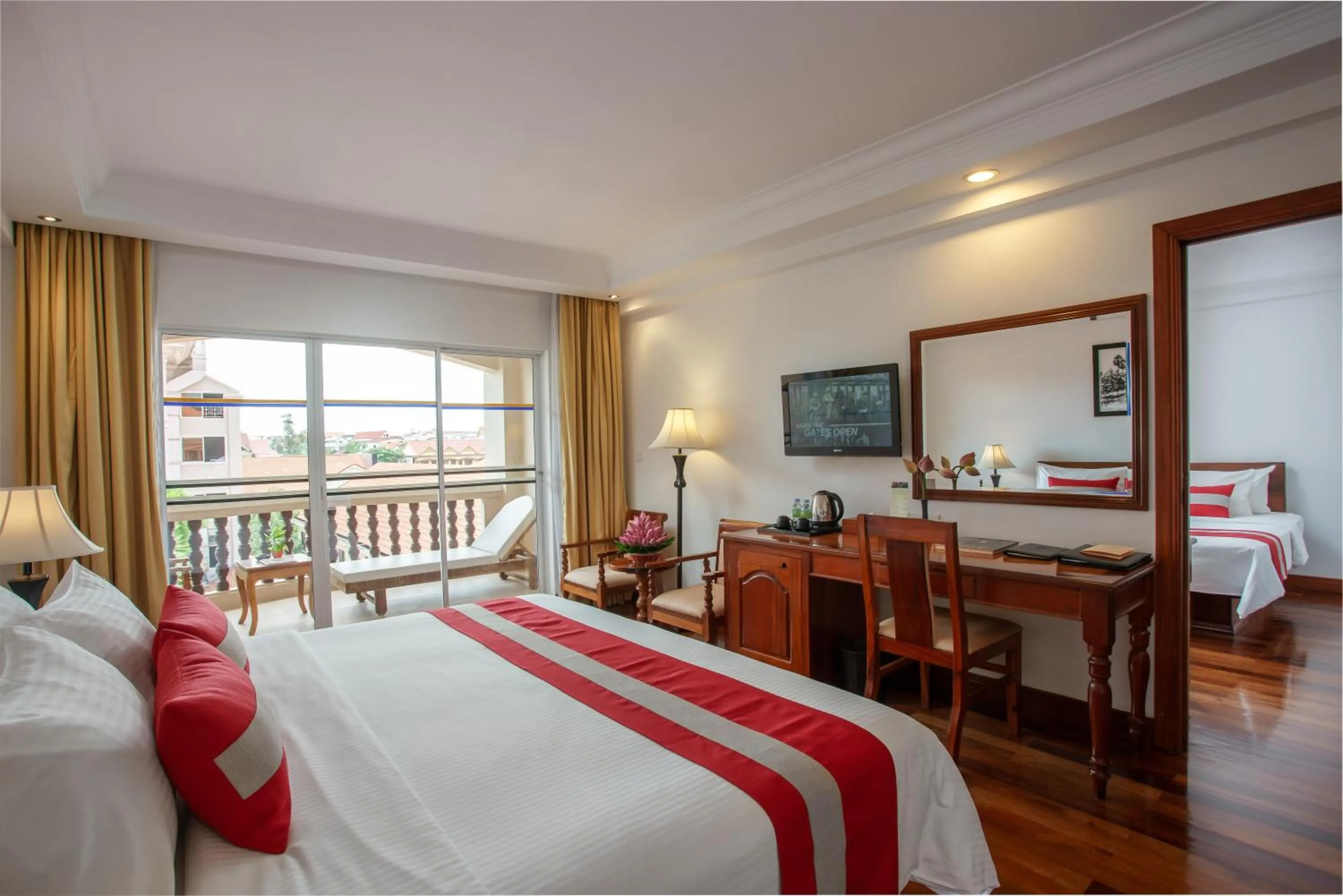 Bed in Hotel Somadevi Angkor Resort & Spa