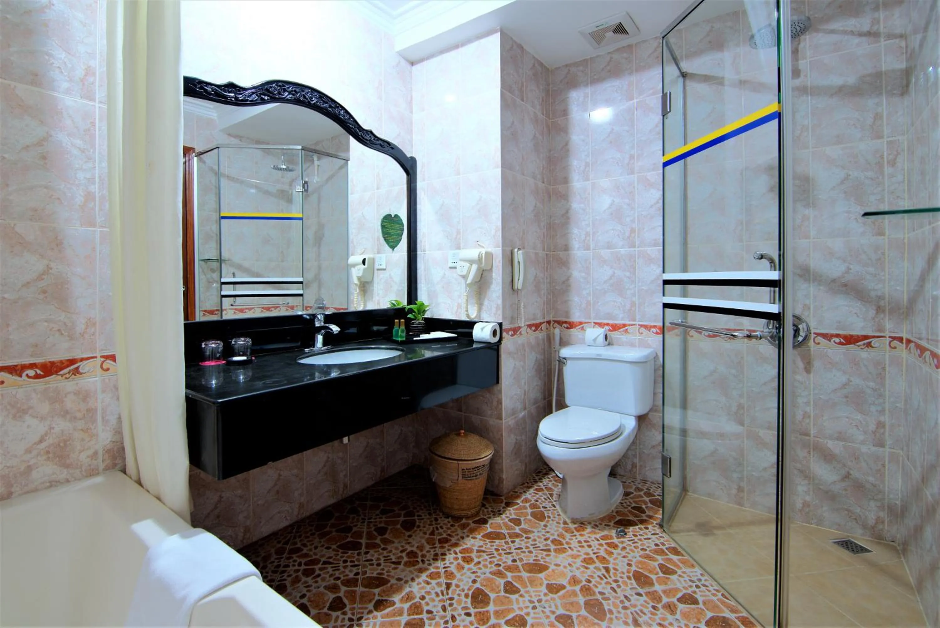Bathroom in Hotel Somadevi Angkor Resort & Spa