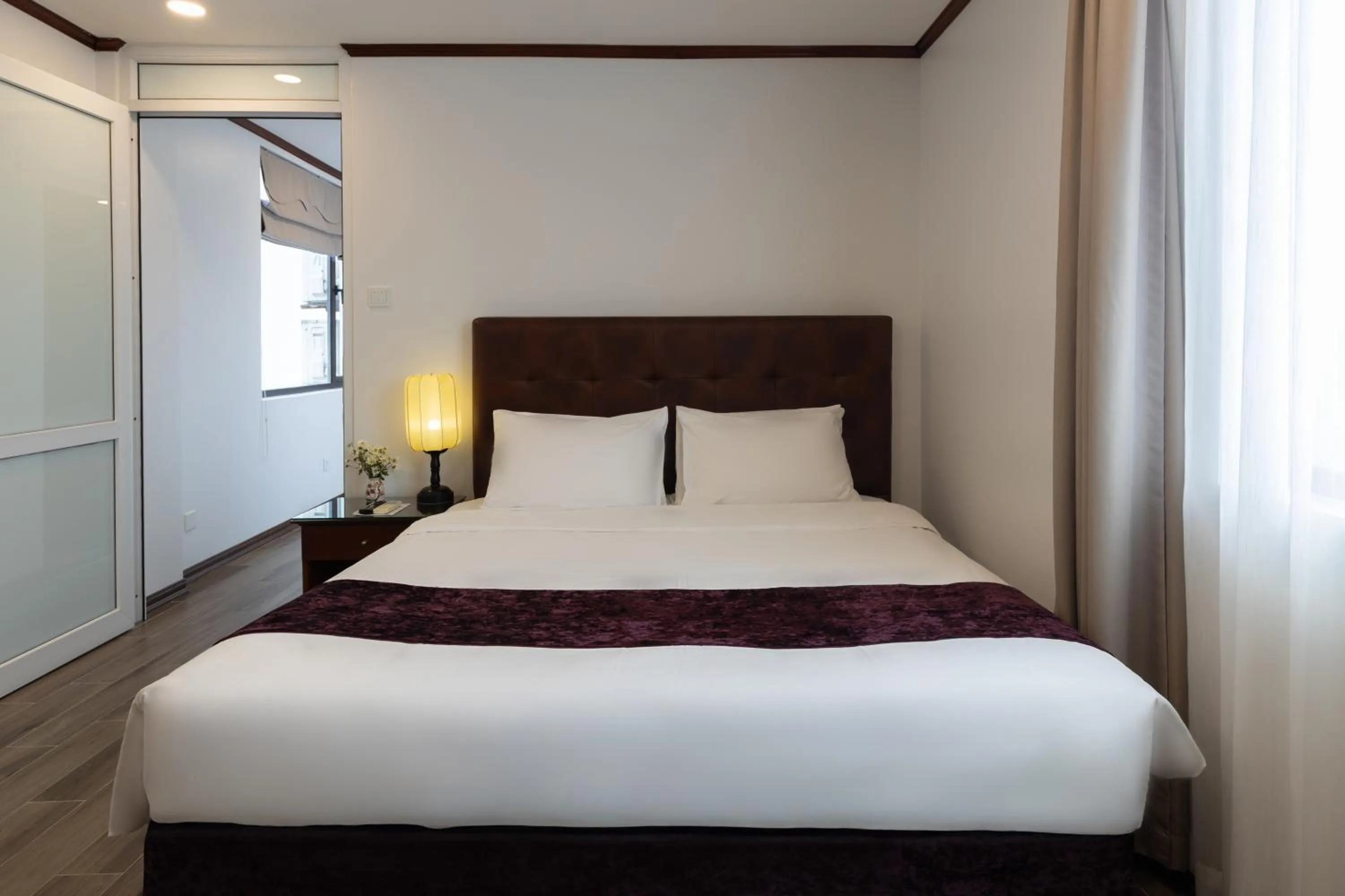 Bed in Flower Garden Hotel