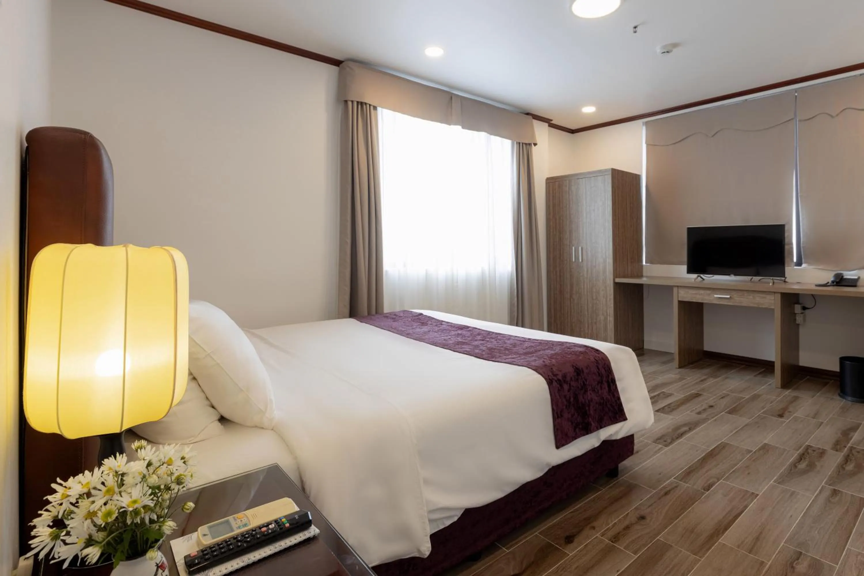 Bed in Flower Garden Hotel