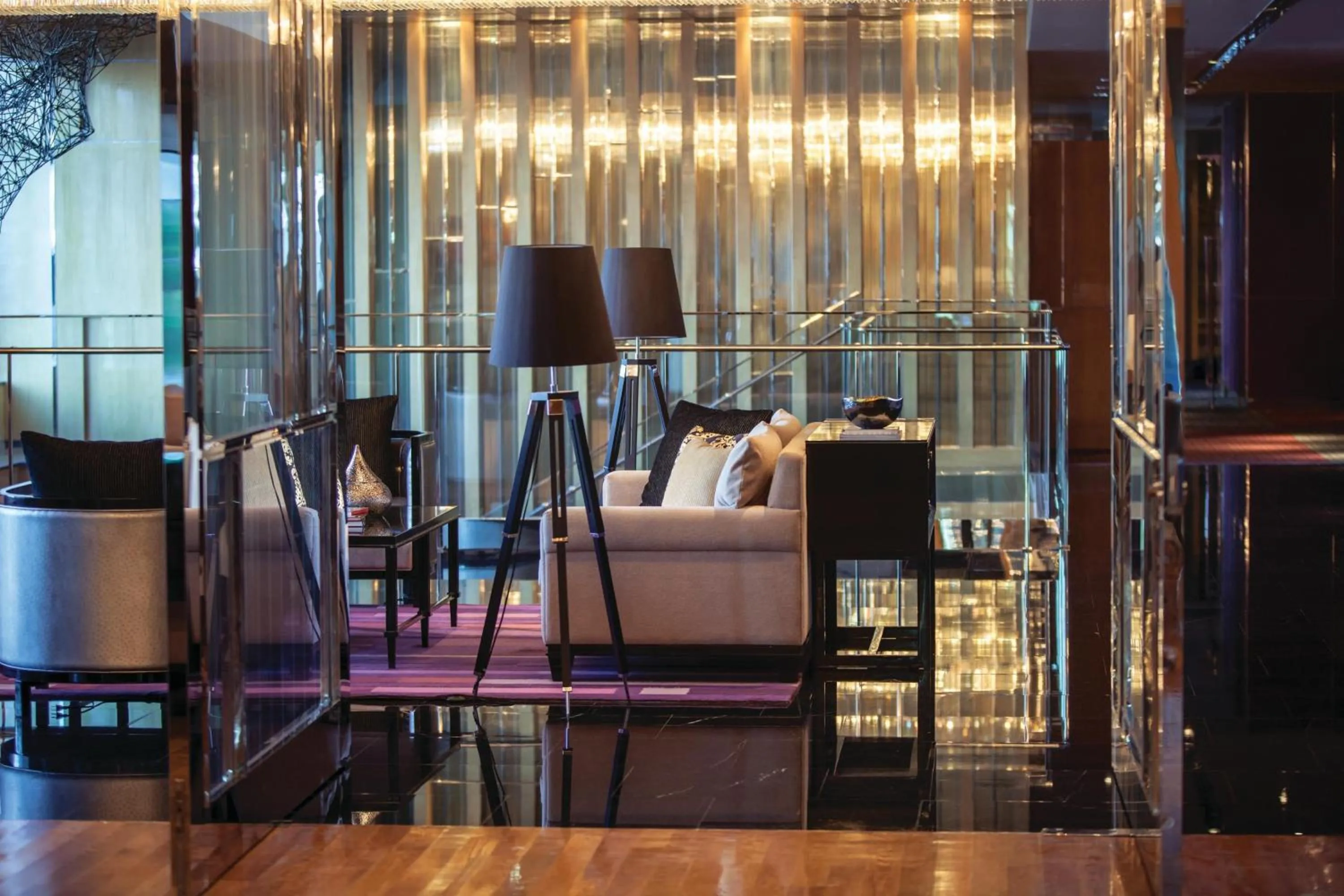 Living room in Renaissance Bangkok Ratchaprasong Hotel by Marriott