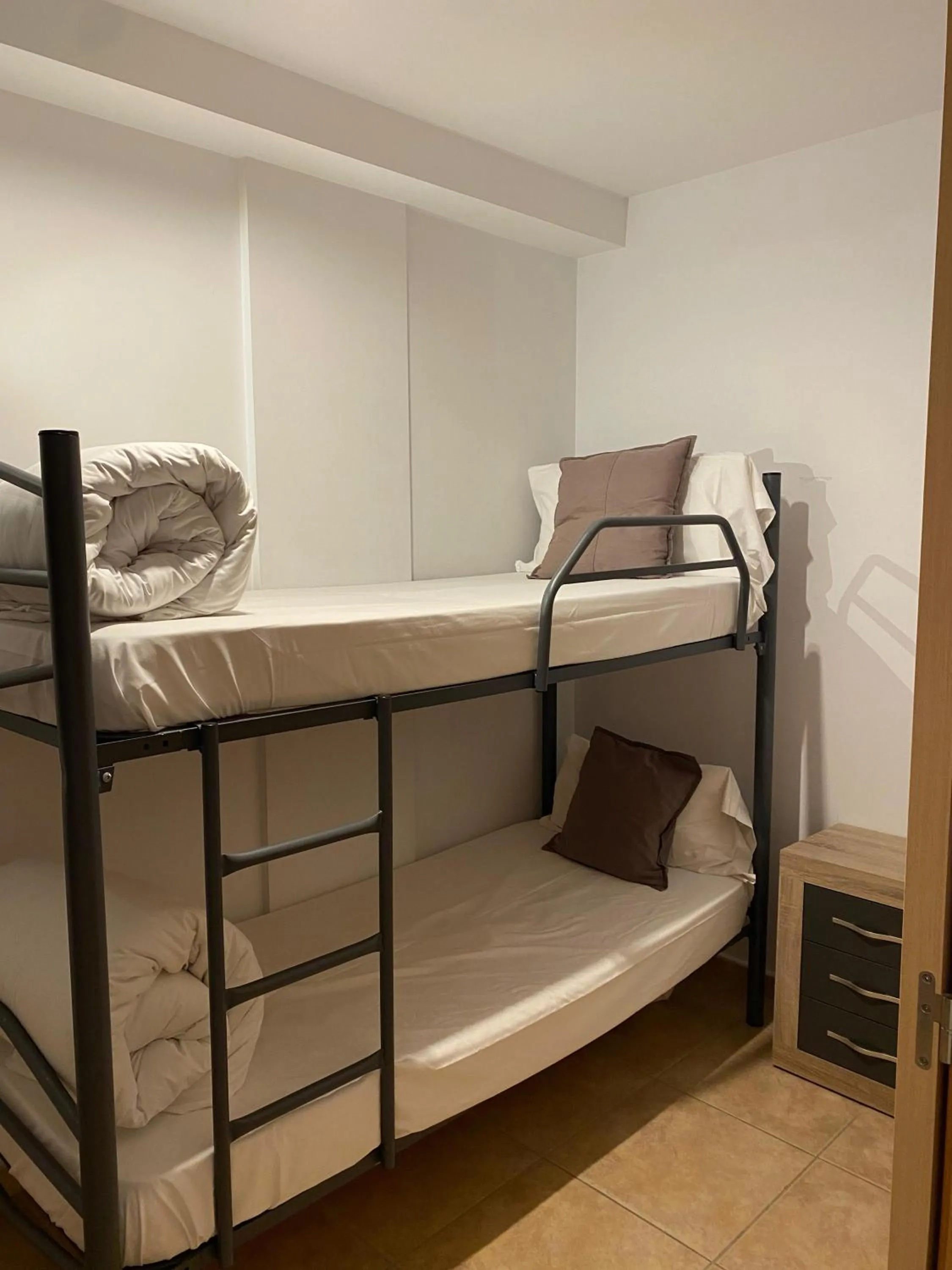 Bed in Font del Ferro Apartments