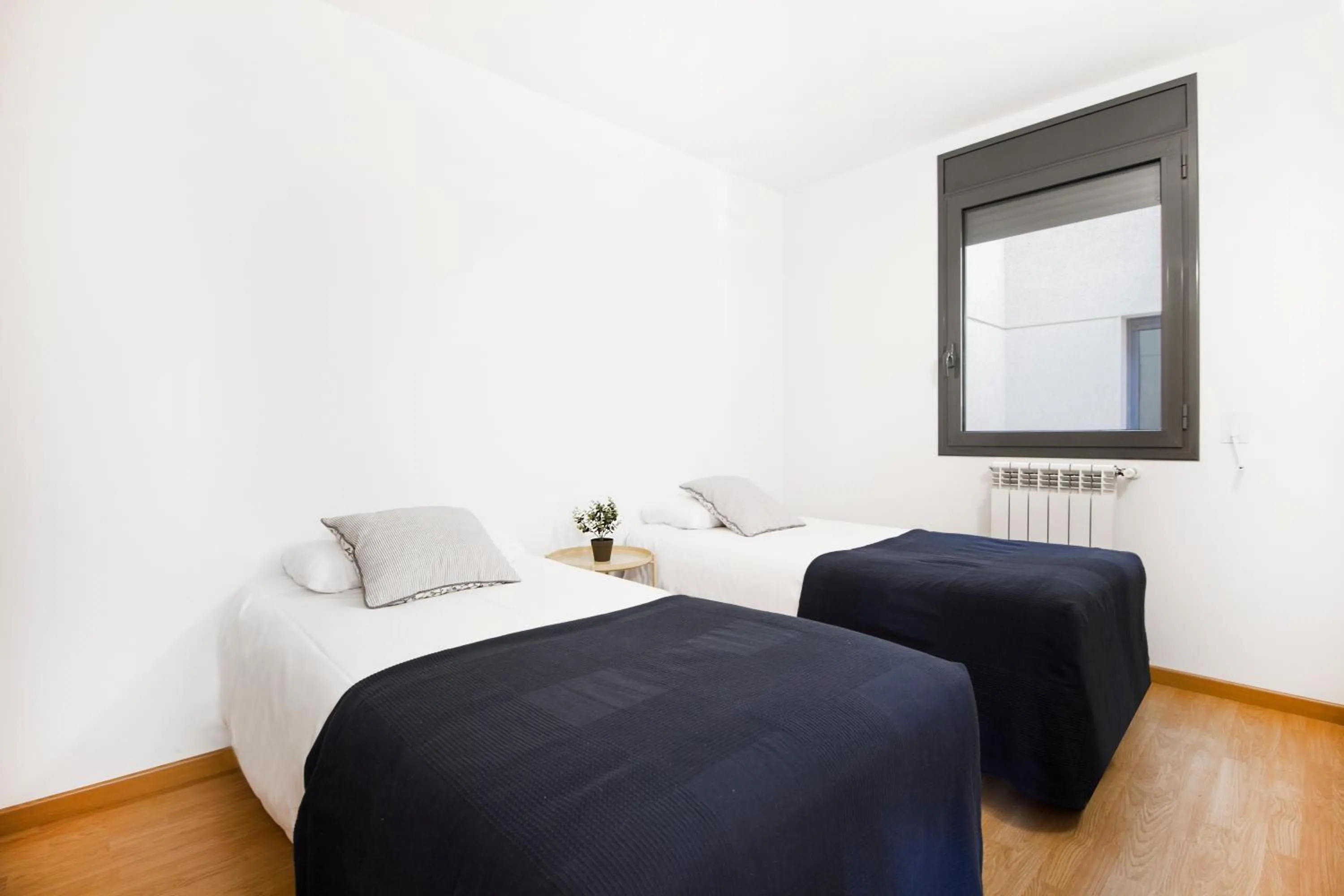 Bed in Font del Ferro Apartments